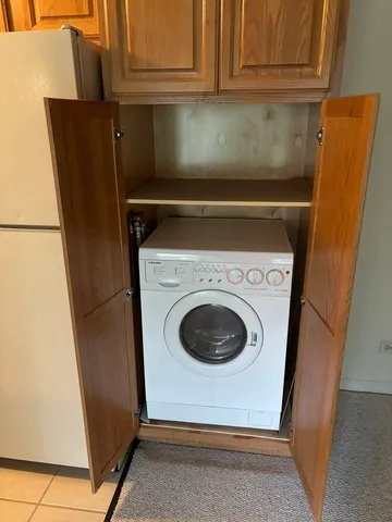 a utility room with dryer and washer
