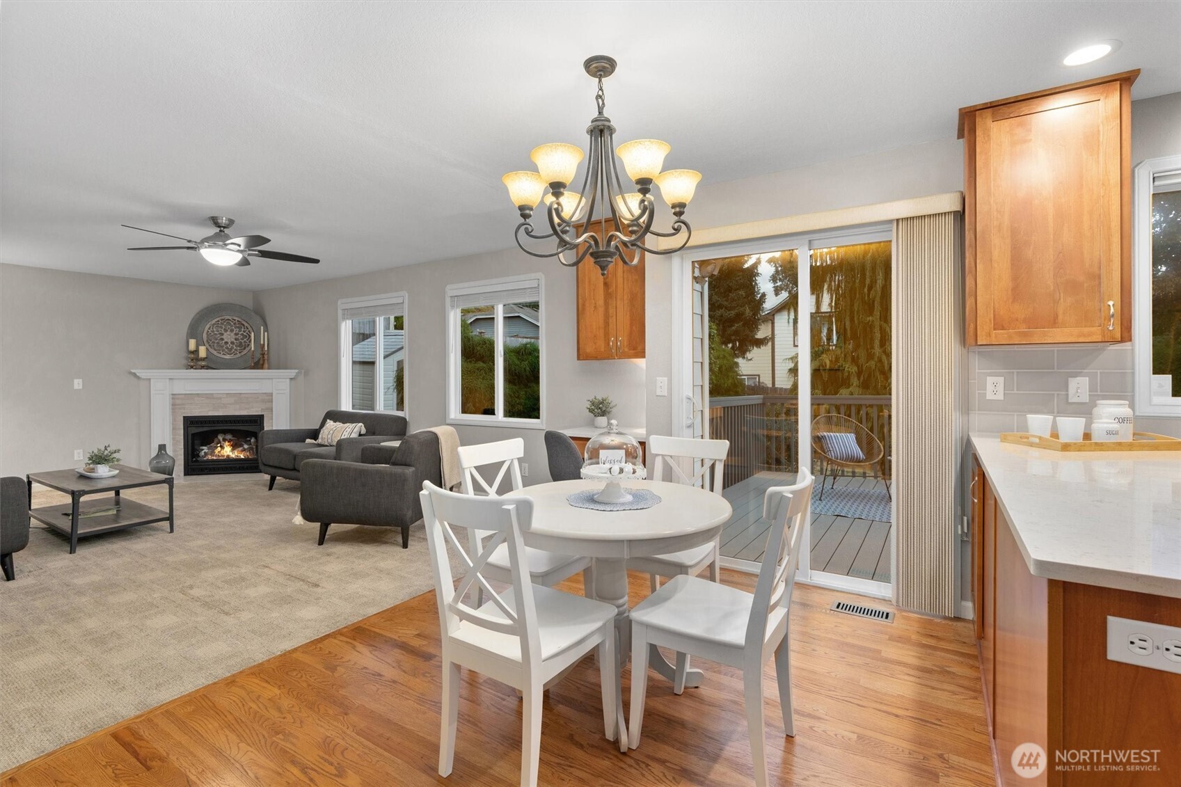 2525 113th Place Southeast Everett, WA 98208 - Photo 12 of 37 a view of a dining room with furniture a chandelier and wooden floor