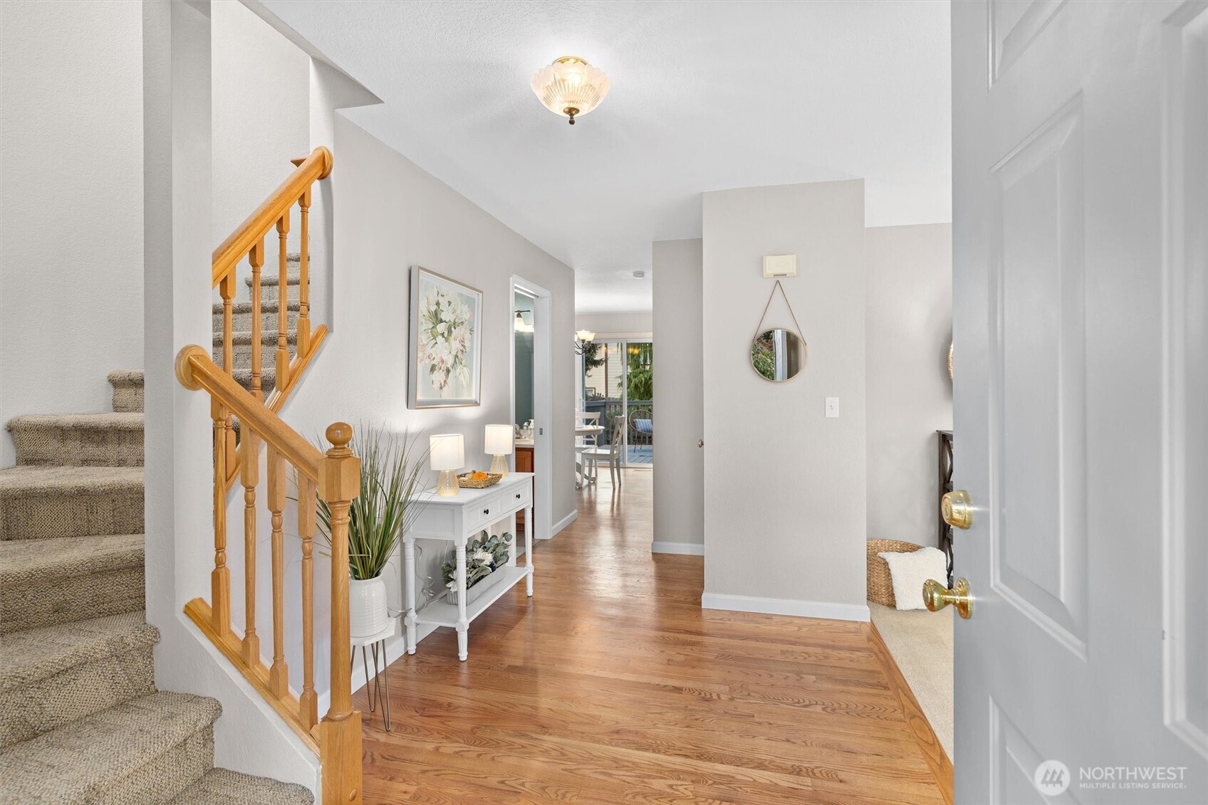 2525 113th Place Southeast Everett, WA 98208 - Photo 16 of 37 a view of a hallway with windows and stairs
