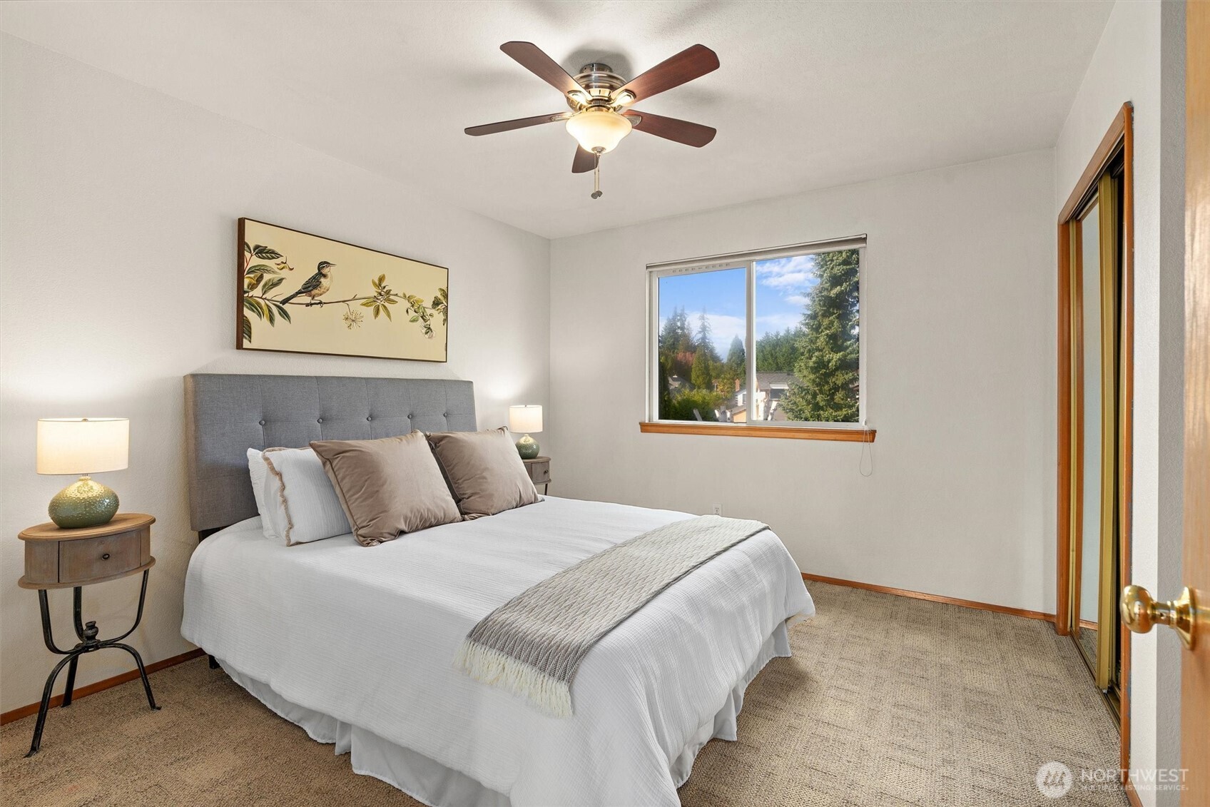 2525 113th Place Southeast Everett, WA 98208 - Photo 20 of 37 a bedroom with a bed and a painting on the wall