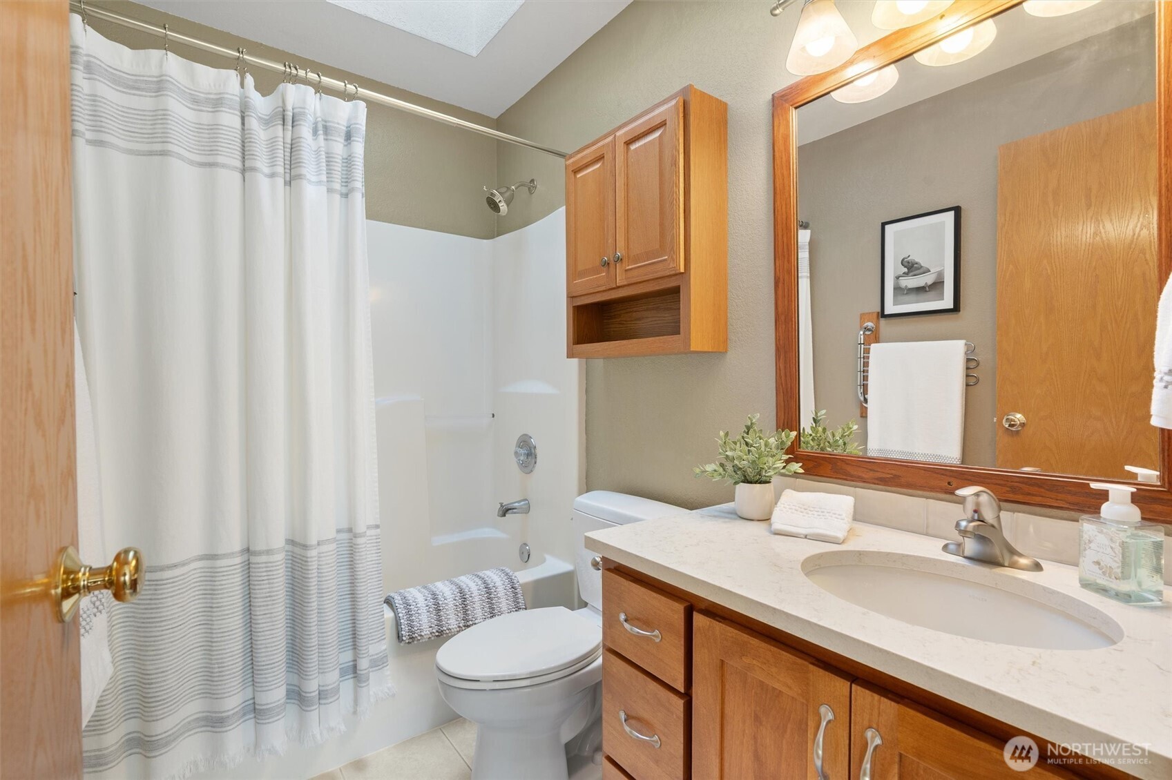 2525 113th Place Southeast Everett, WA 98208 - Photo 21 of 37 a bathroom with a granite countertop sink and a mirror