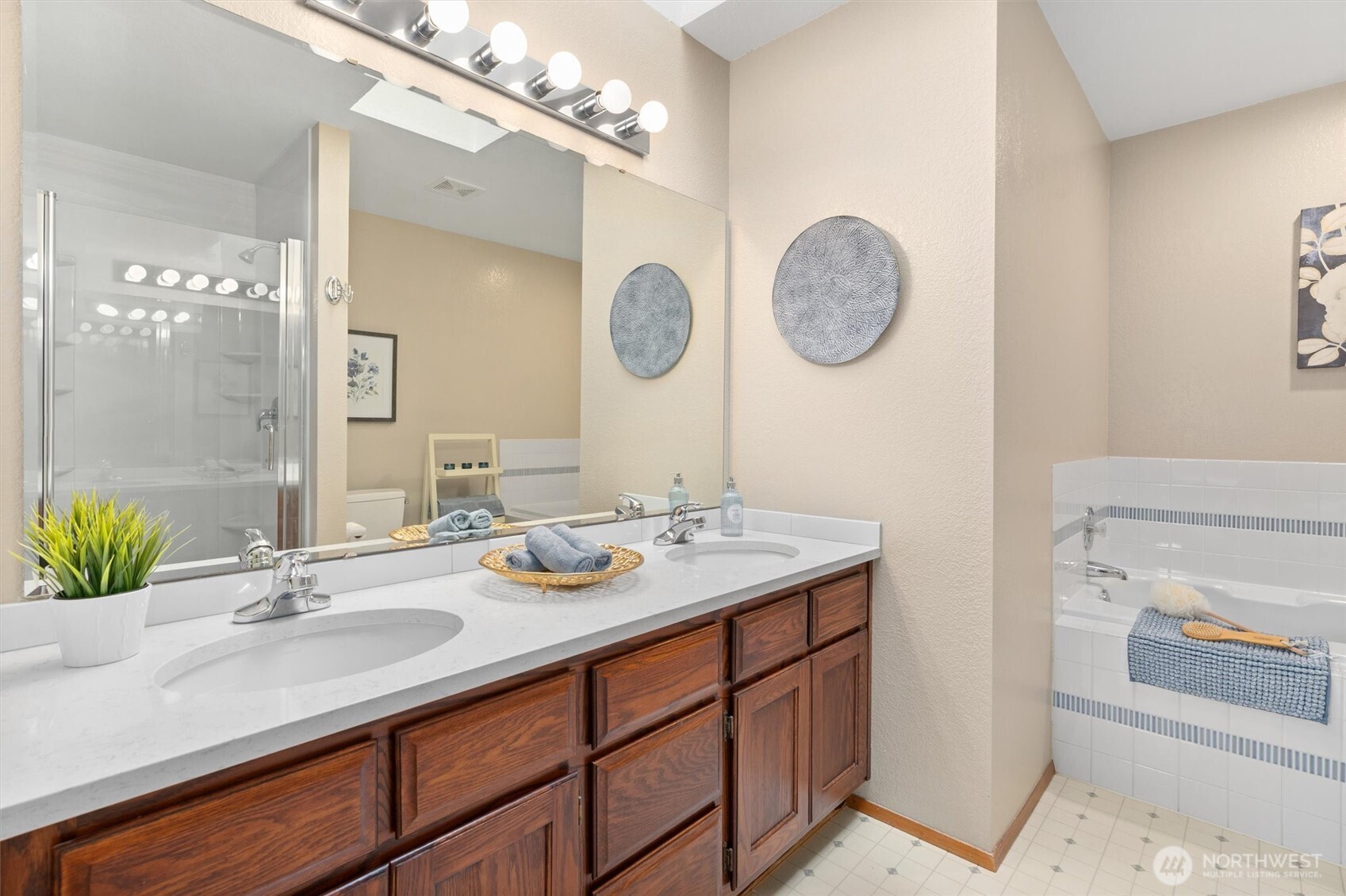 2525 113th Place Southeast Everett, WA 98208 - Photo 25 of 37 a bathroom with a granite countertop sink and a mirror
