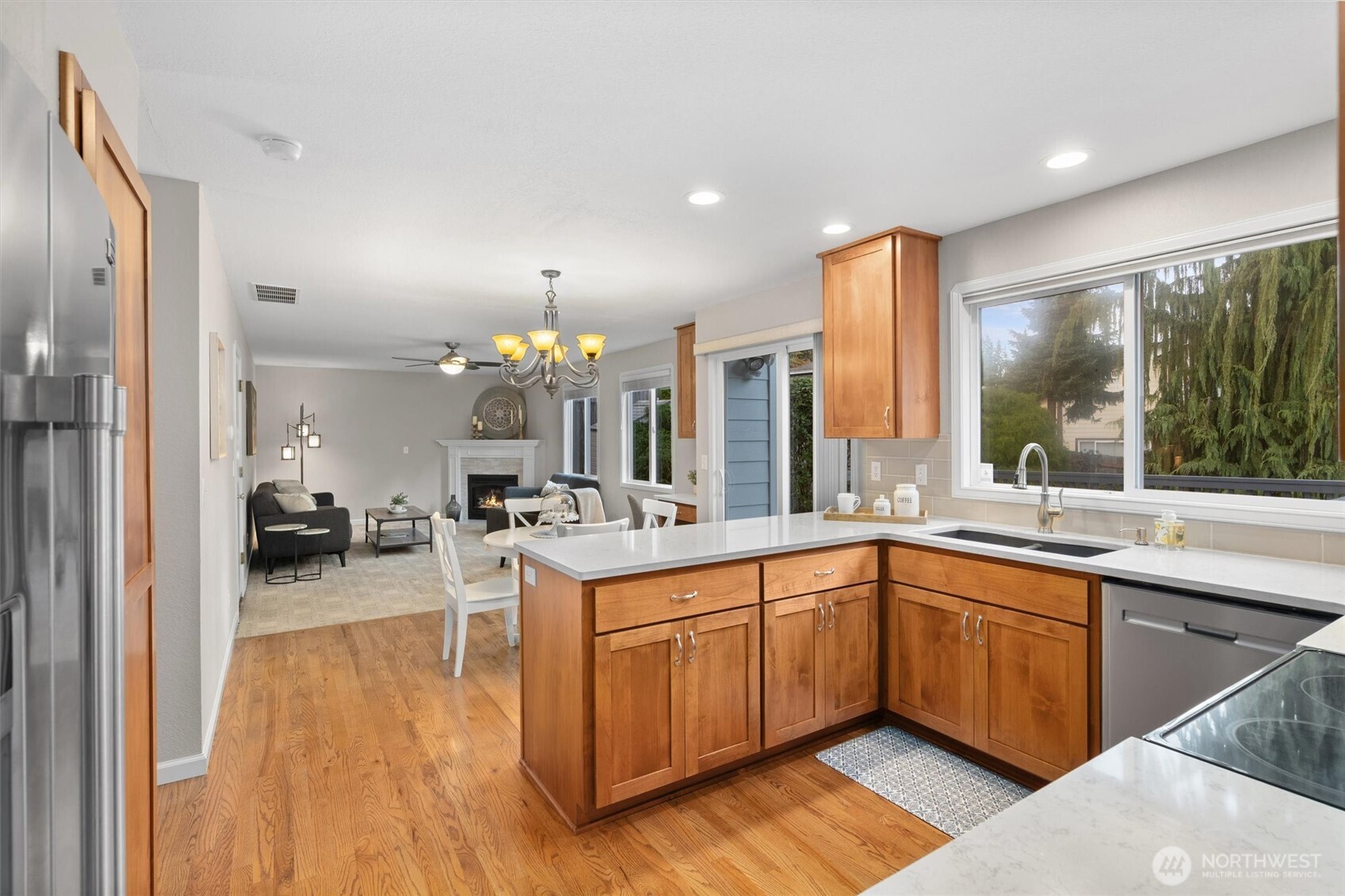 2525 113th Place Southeast Everett, WA 98208 - Photo 9 of 37 a kitchen with a sink cabinets and wooden floor