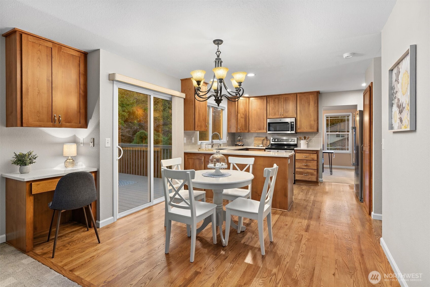 2525 113th Place Southeast Everett, WA 98208 - Photo 10 of 37 a view of a dining room with furniture window and wooden floor