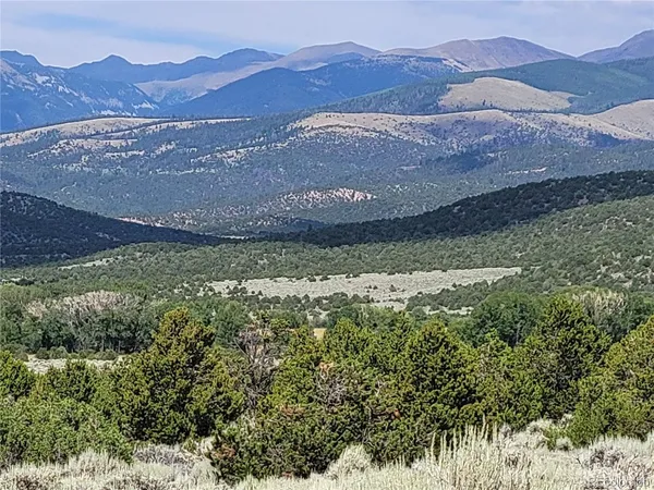 a view of a house with a mountain