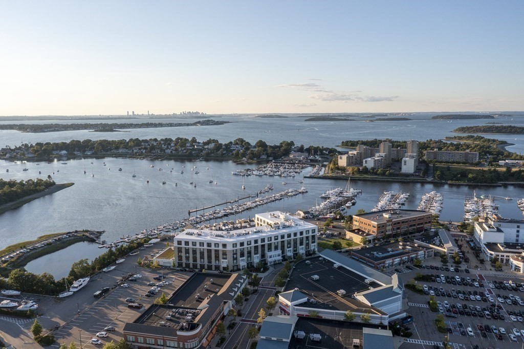 10 Shipyard Drive, Unit 312 Hingham, MA 02043 - Photo 29 of 35 a view of a lake with city