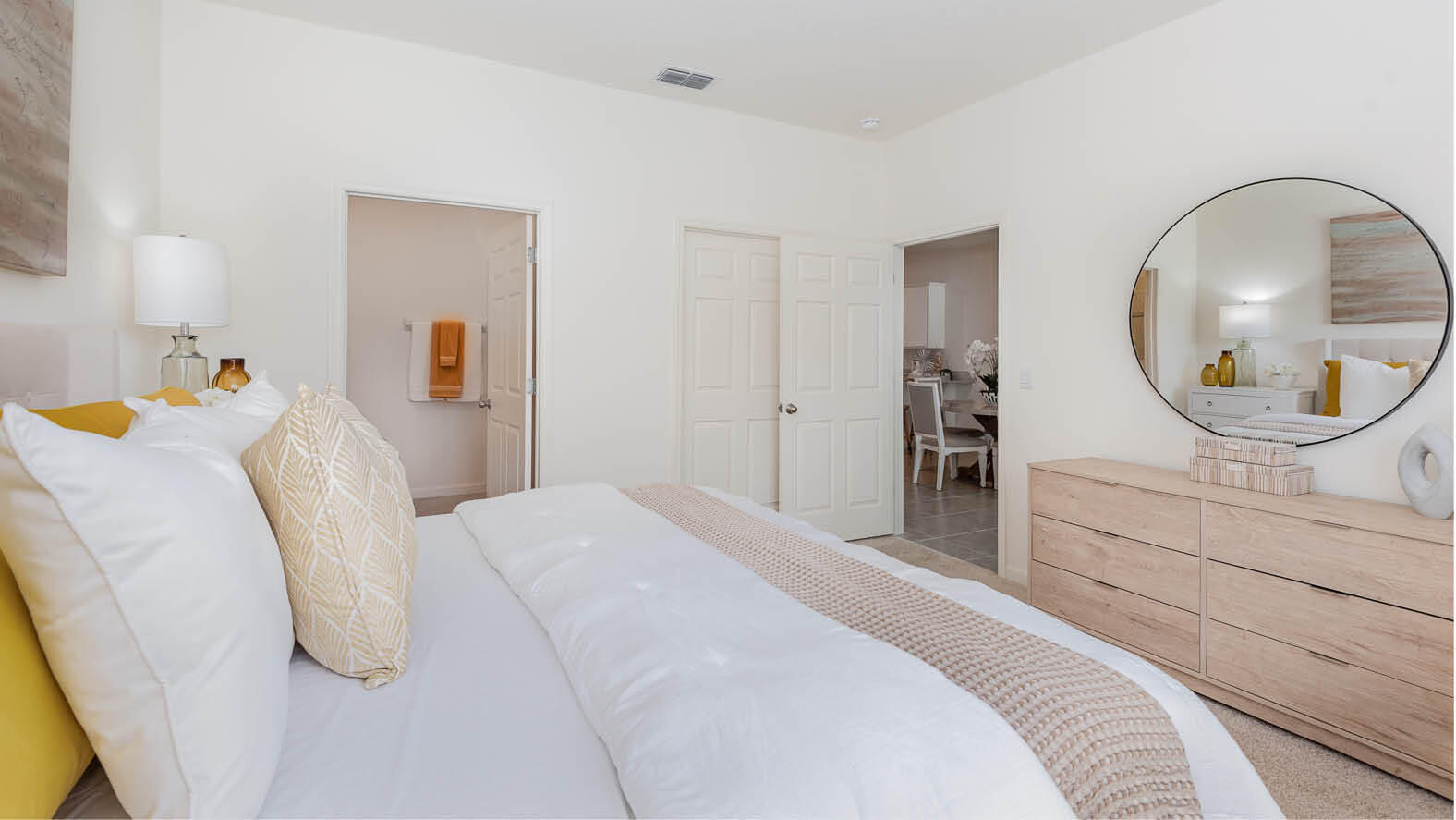 3435 Morrow Place Mims, FL 32754 - Photo 12 of 42 a bedroom with a bed and a mirror