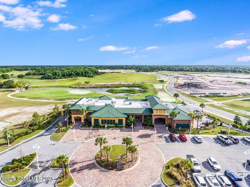 3435 Morrow Place Mims, FL 32754 - Photo 24 of 42 a view of a swimming pool and an ocean view