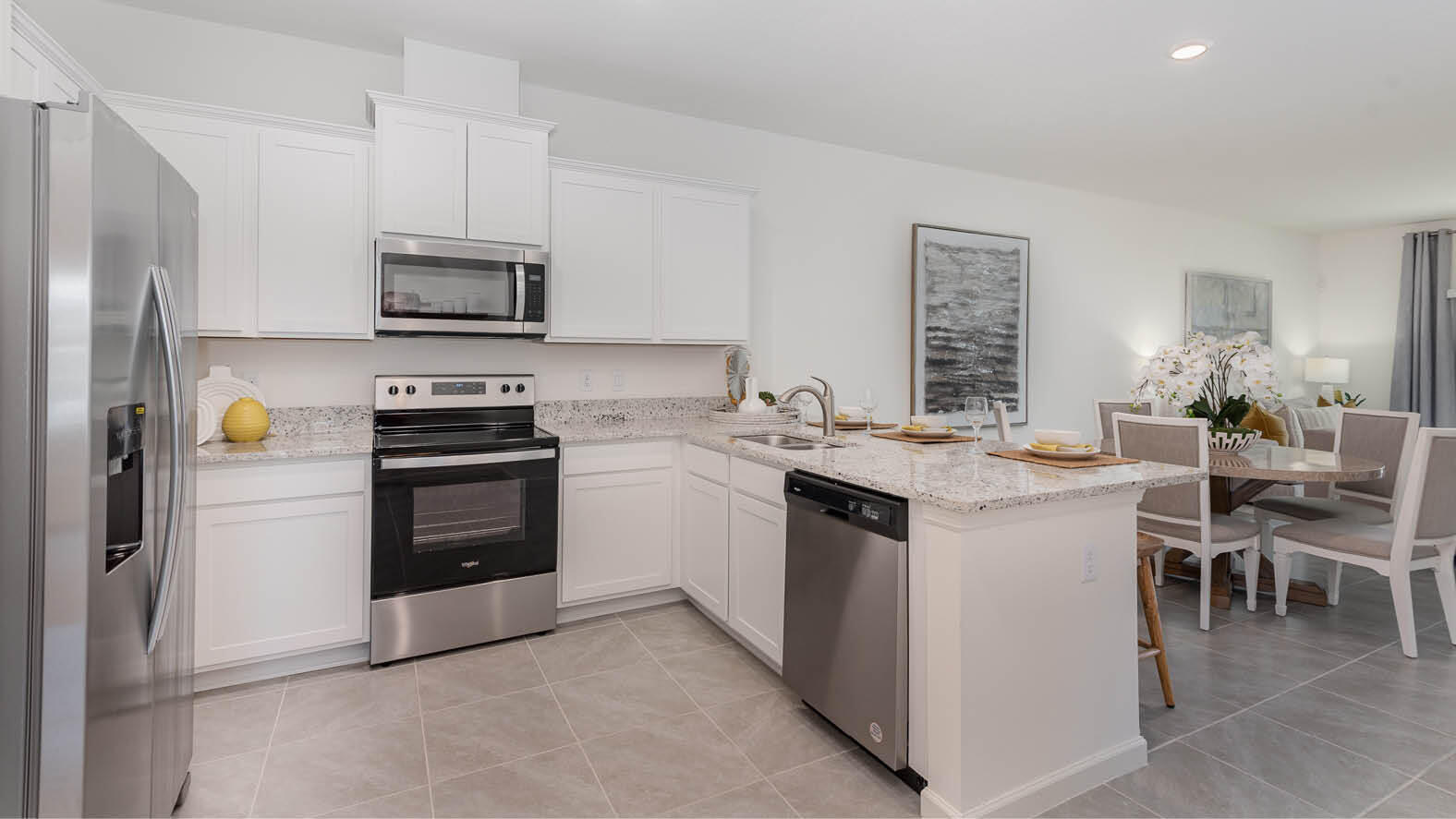 3435 Morrow Place Mims, FL 32754 - Photo 9 of 42 a kitchen with a sink stove and refrigerator