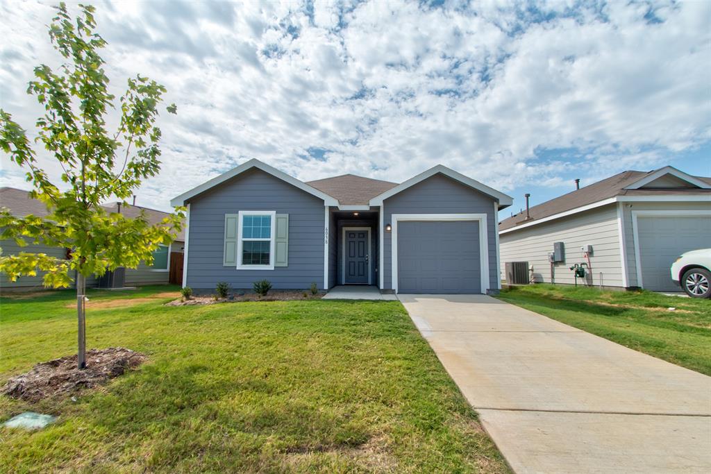 6038 Determine Lane Forney, TX 75126 - Photo 1 of 1 a view of a house with a yard and tree s
