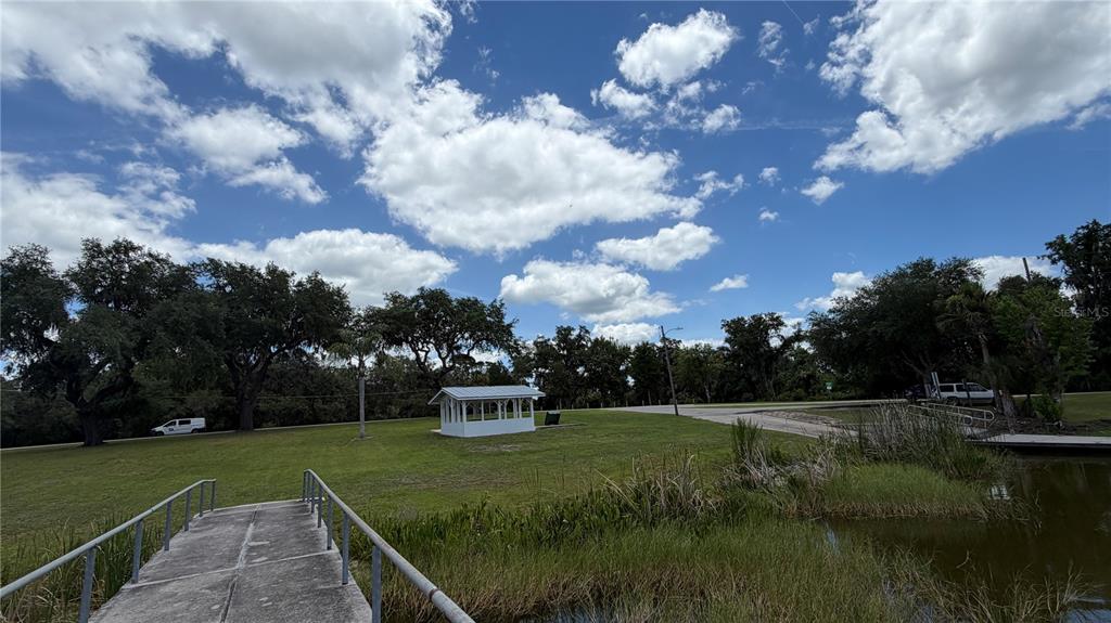 0 Lakeview Street Umatilla, FL 32784 - Photo 6 of 14 a view of a lake with green space