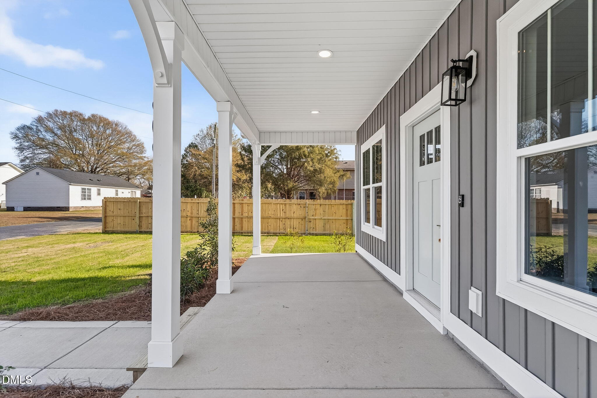 609 West Godwin Street Dunn, NC 28334 - Photo 6 of 38 a view of a house with a porch