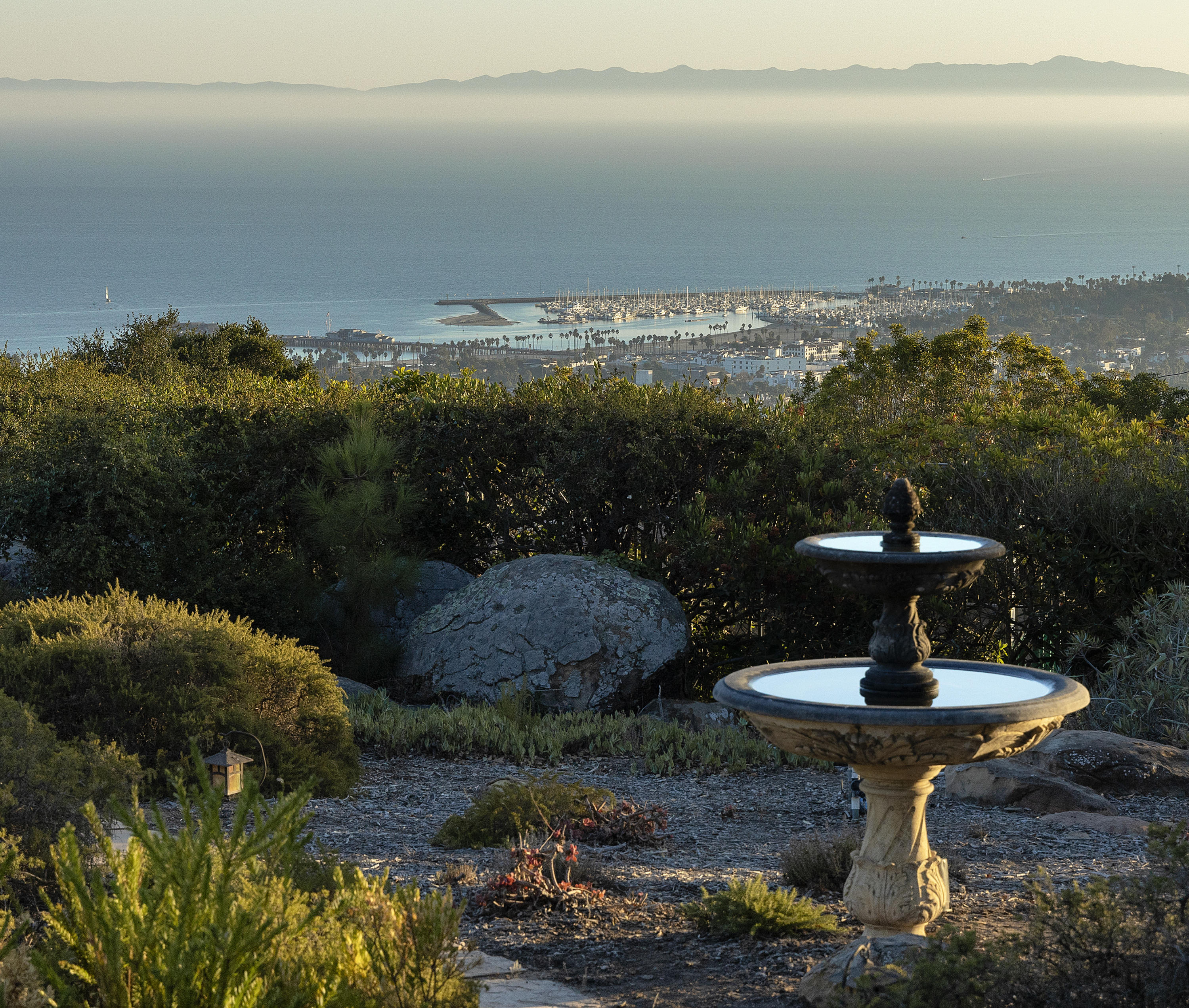 1215 High Ridge Lane Santa Barbara, CA 93103 - Photo 3 of 20 a view of a lake with a yard