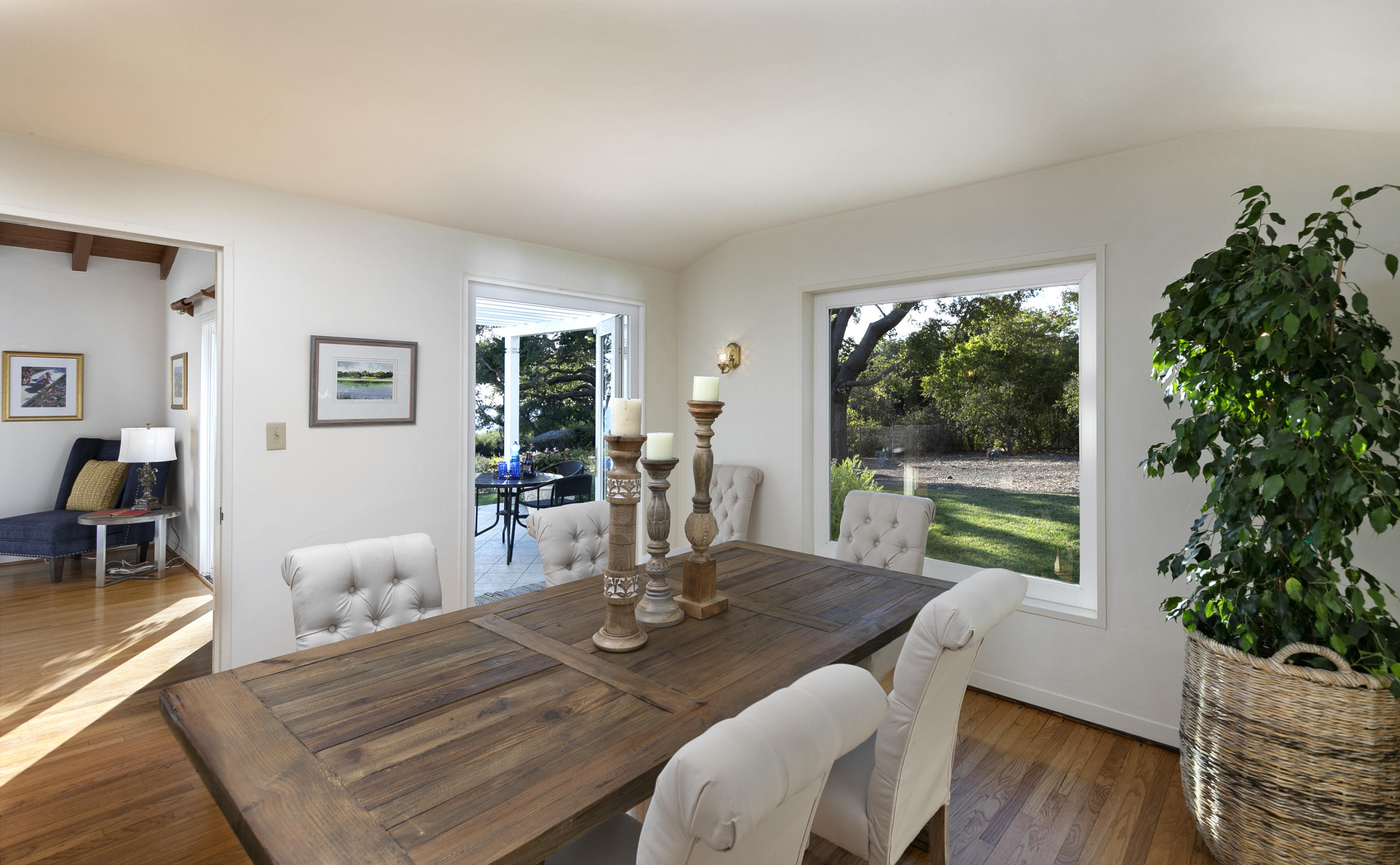 1215 High Ridge Lane Santa Barbara, CA 93103 - Photo 8 of 20 a view of a dining room with furniture window and wooden floor