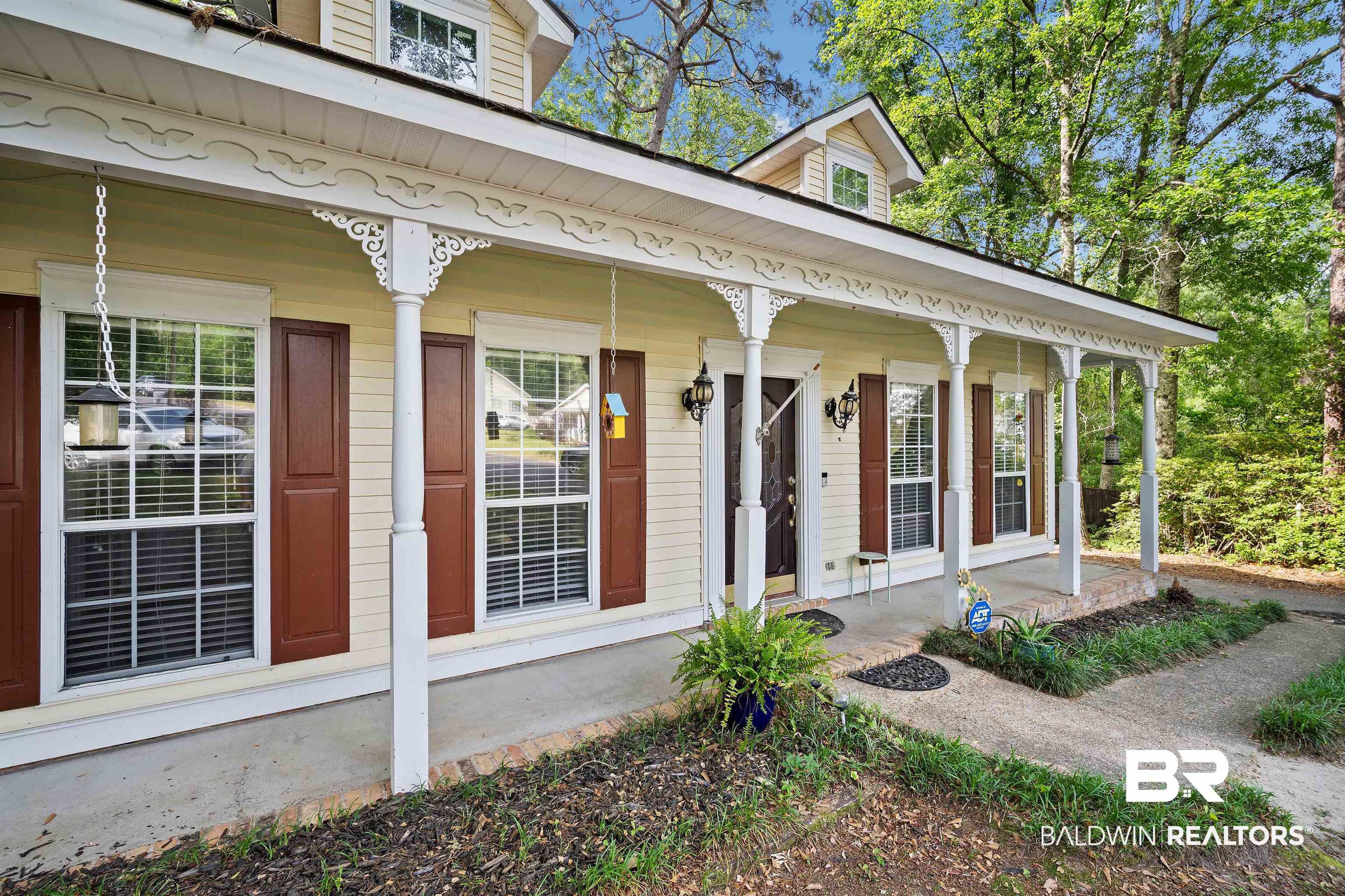2823 Woodland Road Mobile, AL 36693 - Photo 29 of 29 Property entrance featuring covered porch
