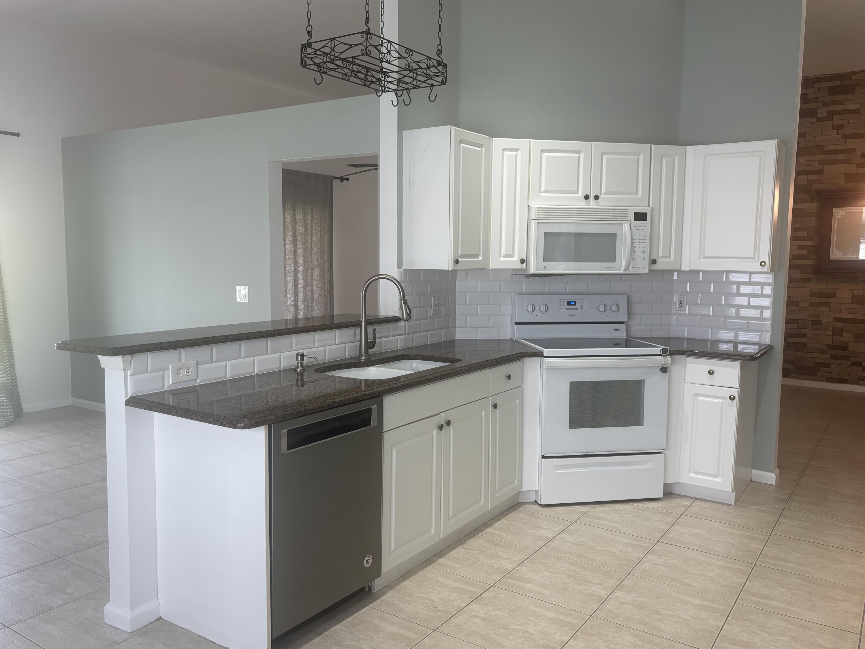 6366 Barbara Street Jupiter, FL 33458 - Photo 5 of 18 IMG_7800