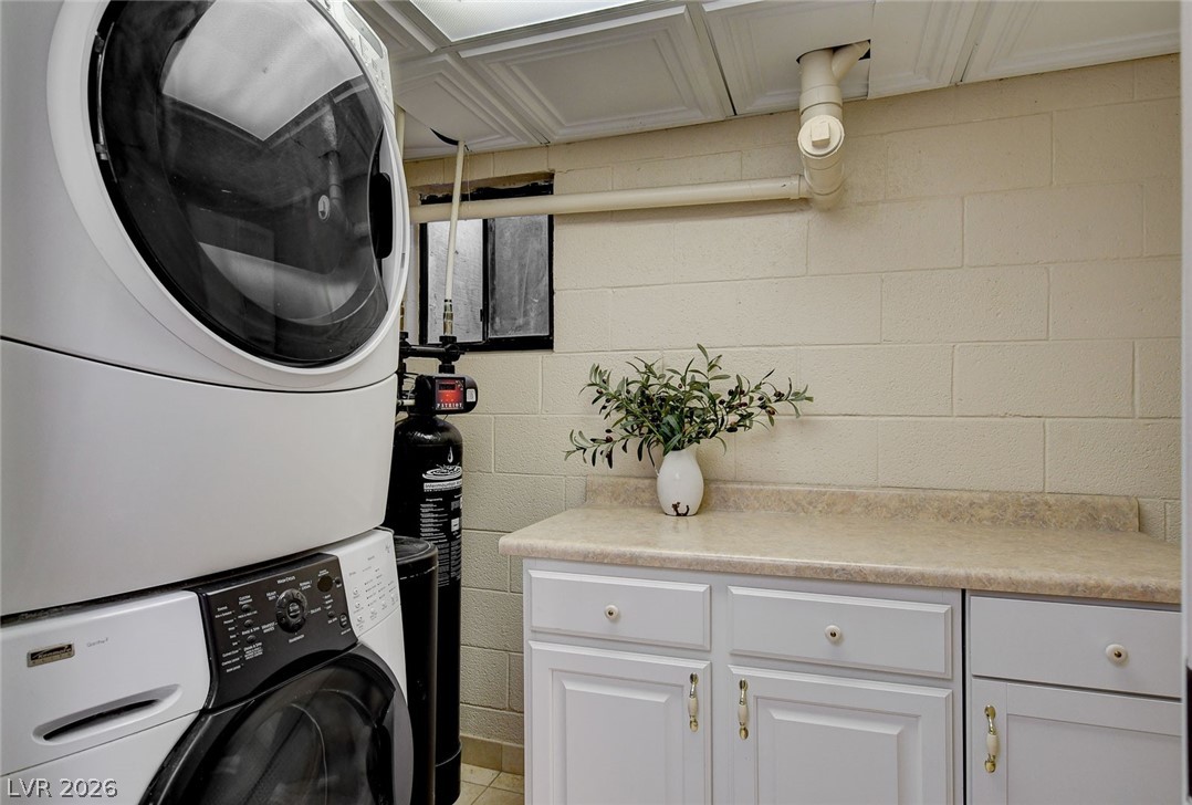 3765 Berkeley Street Logandale, NV 89021 - Photo 58 of 87 This dedicated laundry space offers practical convenience for daily chores.