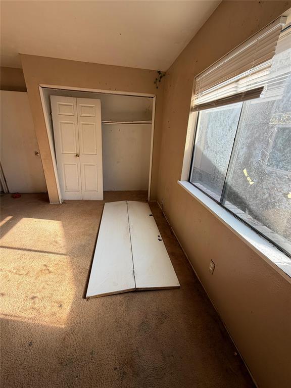 7200 Timber Trail Fort Worth, TX 76134 - Photo 11 of 18 a view of a small space with wooden floor and windows