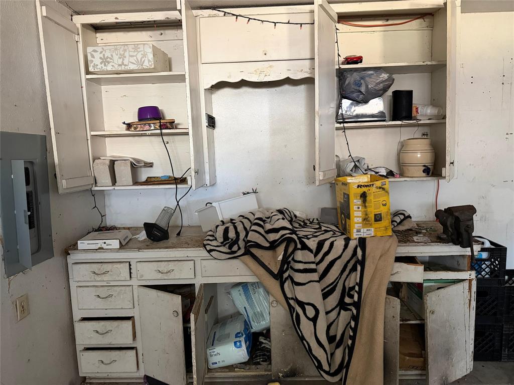 7200 Timber Trail Fort Worth, TX 76134 - Photo 13 of 18 a kitchen with stainless steel appliances a stove and a refrigerator