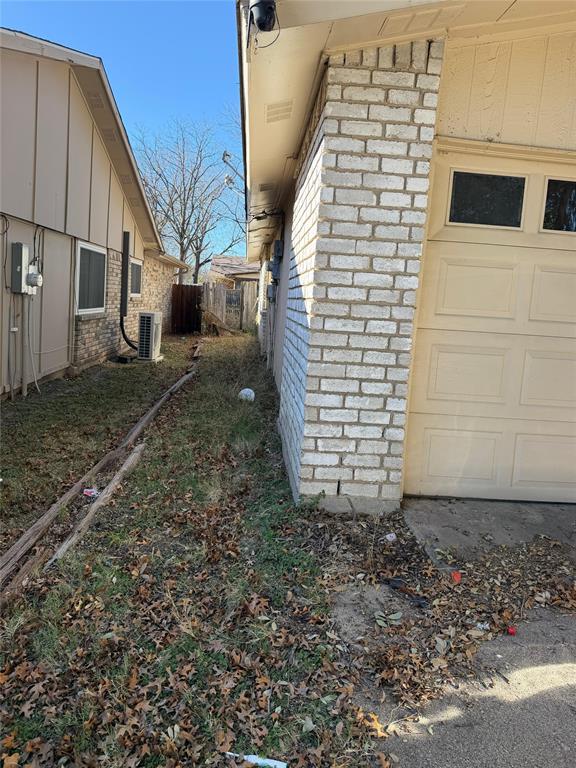 7200 Timber Trail Fort Worth, TX 76134 - Photo 18 of 18 a view of a house with a yard
