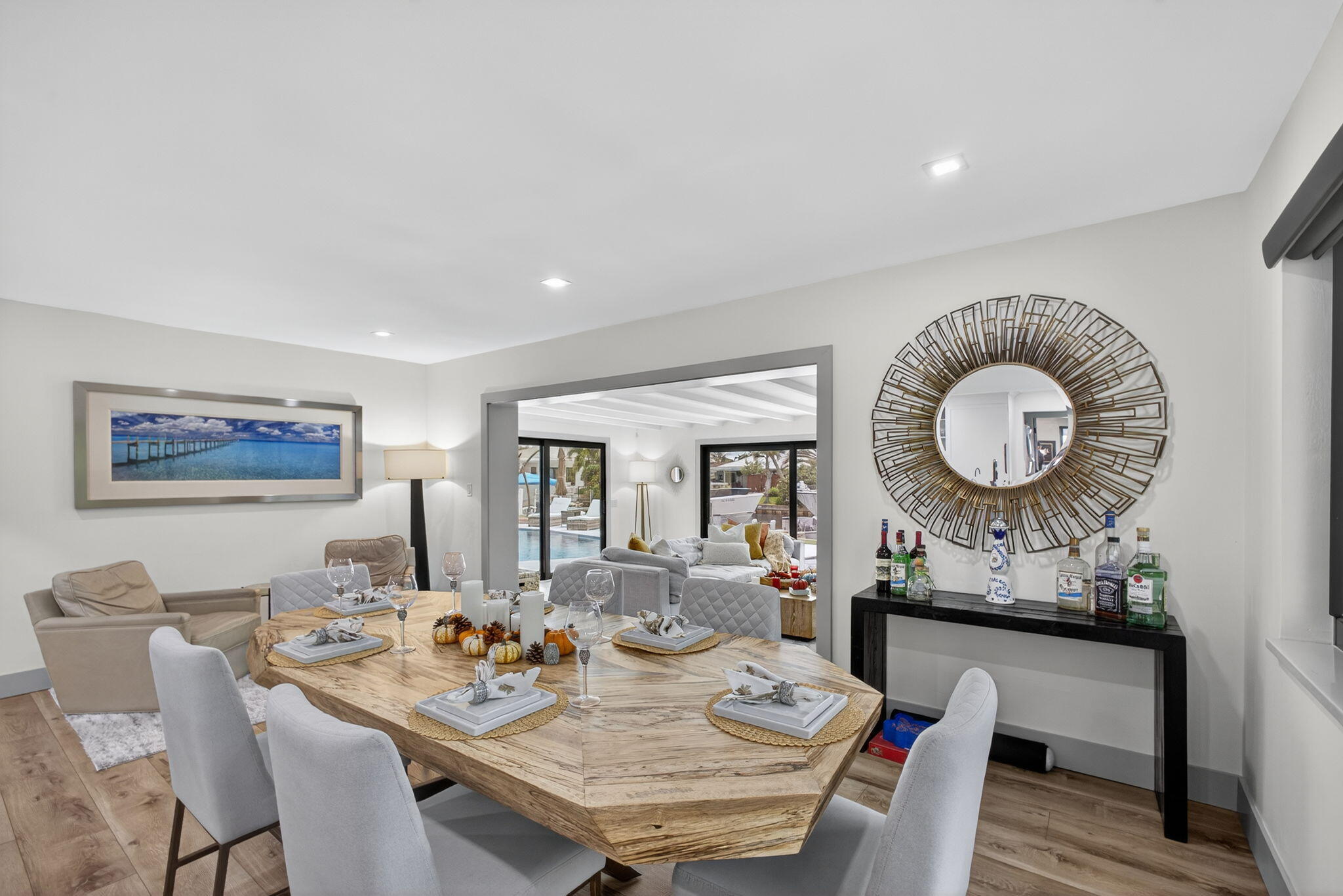 12 Leeward Circle Tequesta, FL 33469 - Photo 15 of 61 a view of a dining room with furniture window and wooden floor