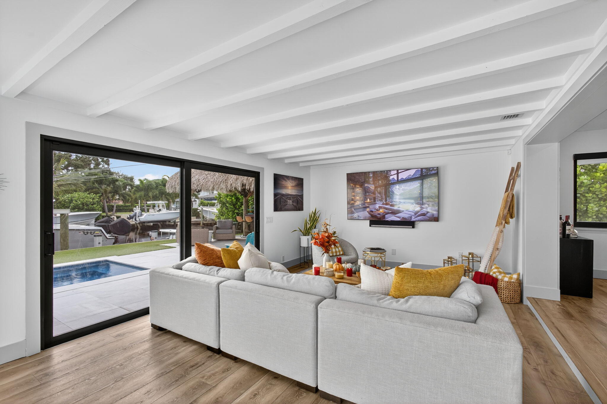 12 Leeward Circle Tequesta, FL 33469 - Photo 20 of 61 a living room with furniture and a large window
