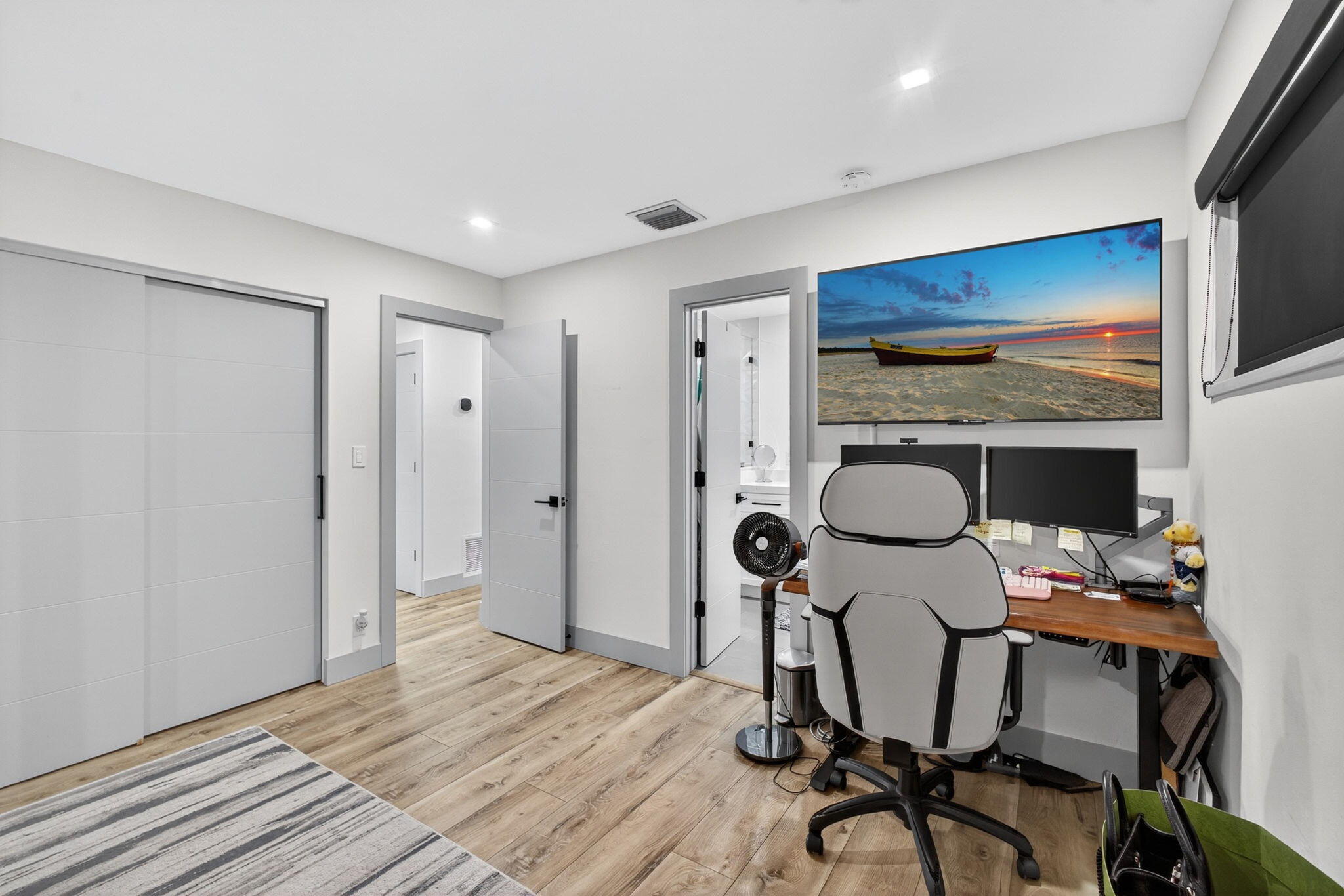 12 Leeward Circle Tequesta, FL 33469 - Photo 26 of 61 a room with furniture and a flat screen tv