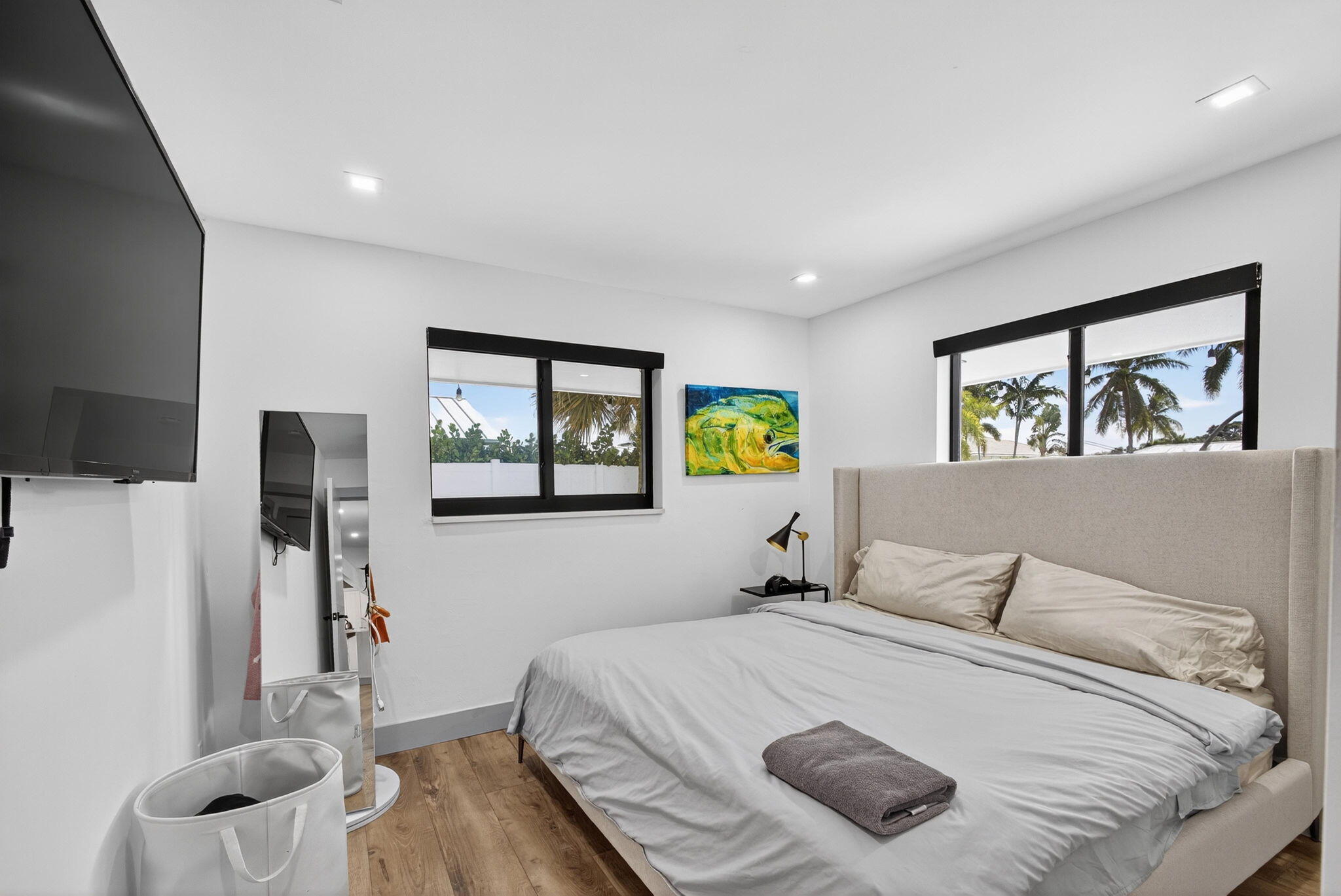 12 Leeward Circle Tequesta, FL 33469 - Photo 33 of 61 a bedroom with a large bed and a window