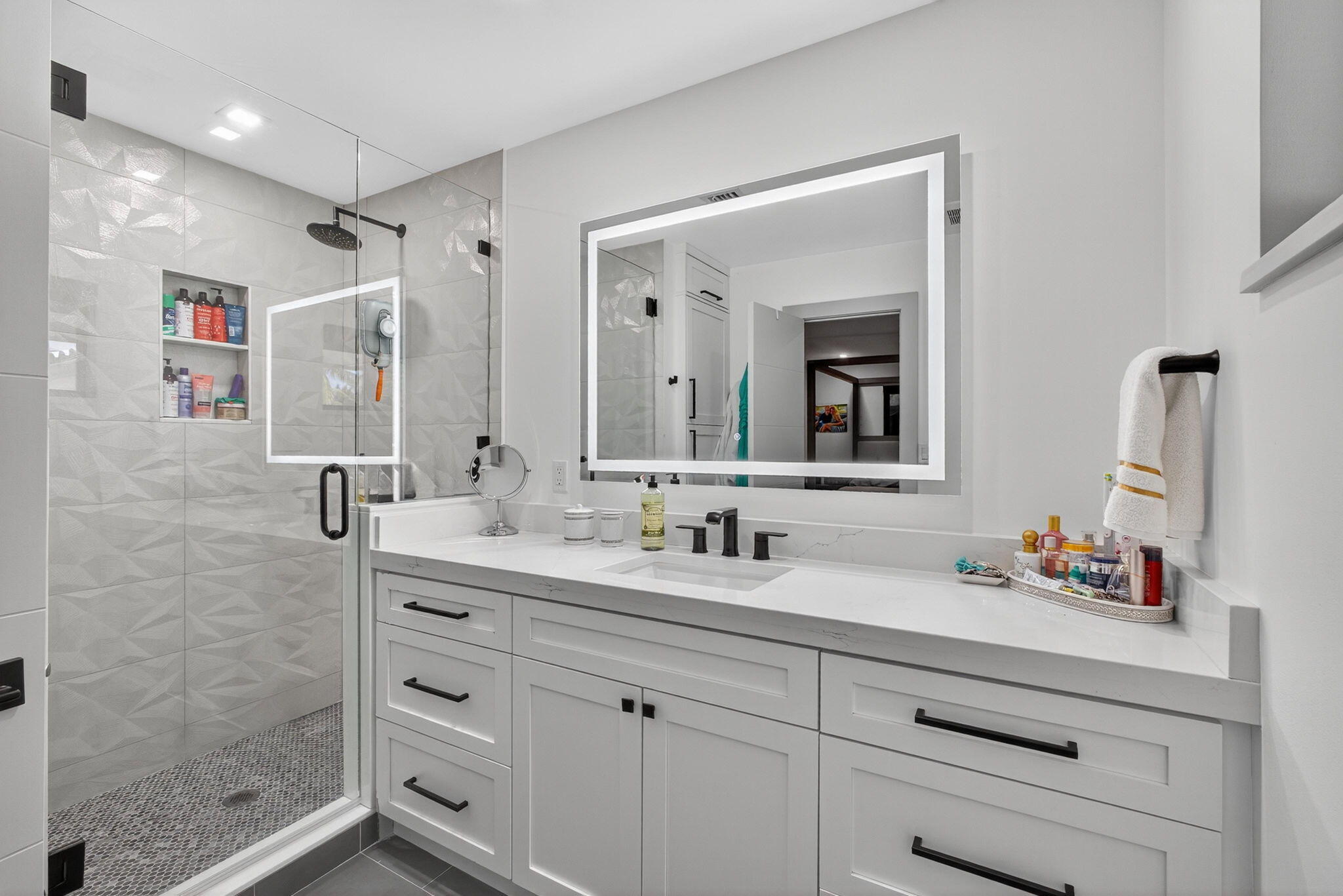 12 Leeward Circle Tequesta, FL 33469 - Photo 34 of 61 a bathroom with a double vanity sink mirror and double