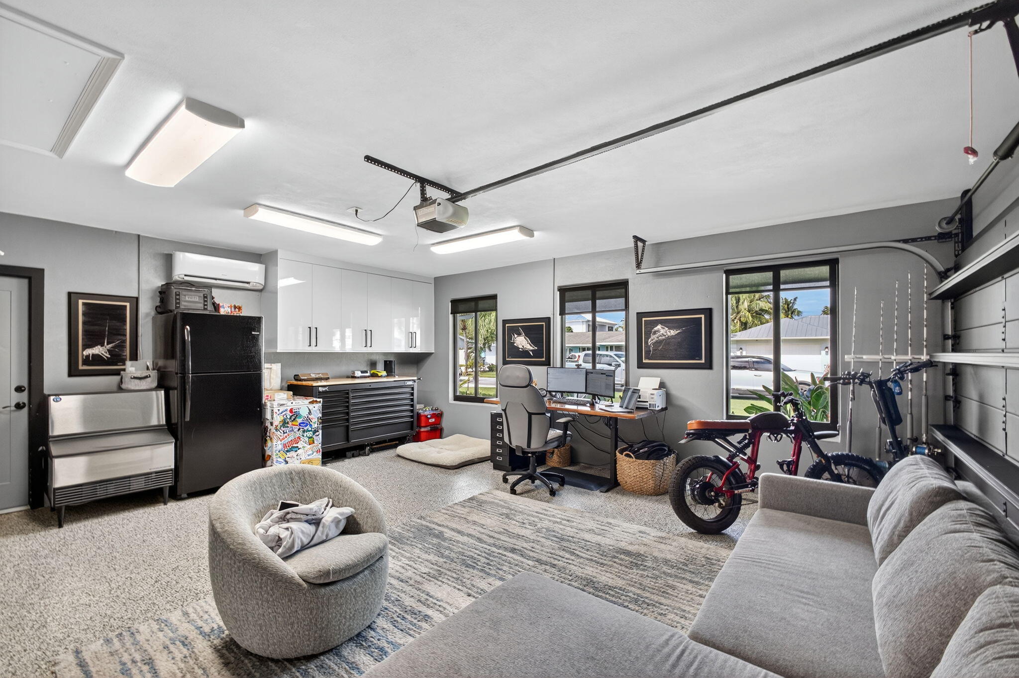 12 Leeward Circle Tequesta, FL 33469 - Photo 37 of 61 a living room with furniture and a fireplace