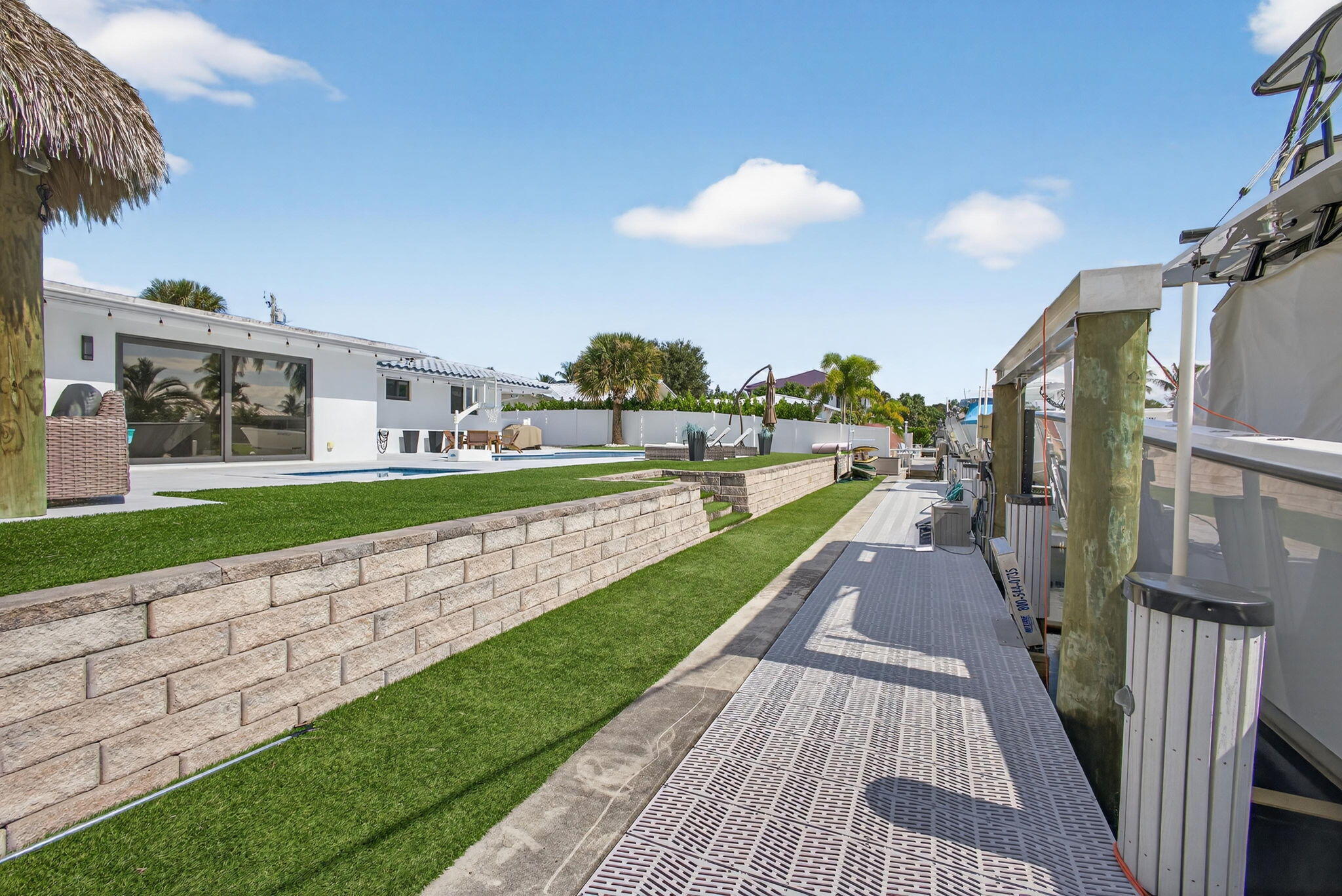 12 Leeward Circle Tequesta, FL 33469 - Photo 48 of 61 a view of a house with a yard