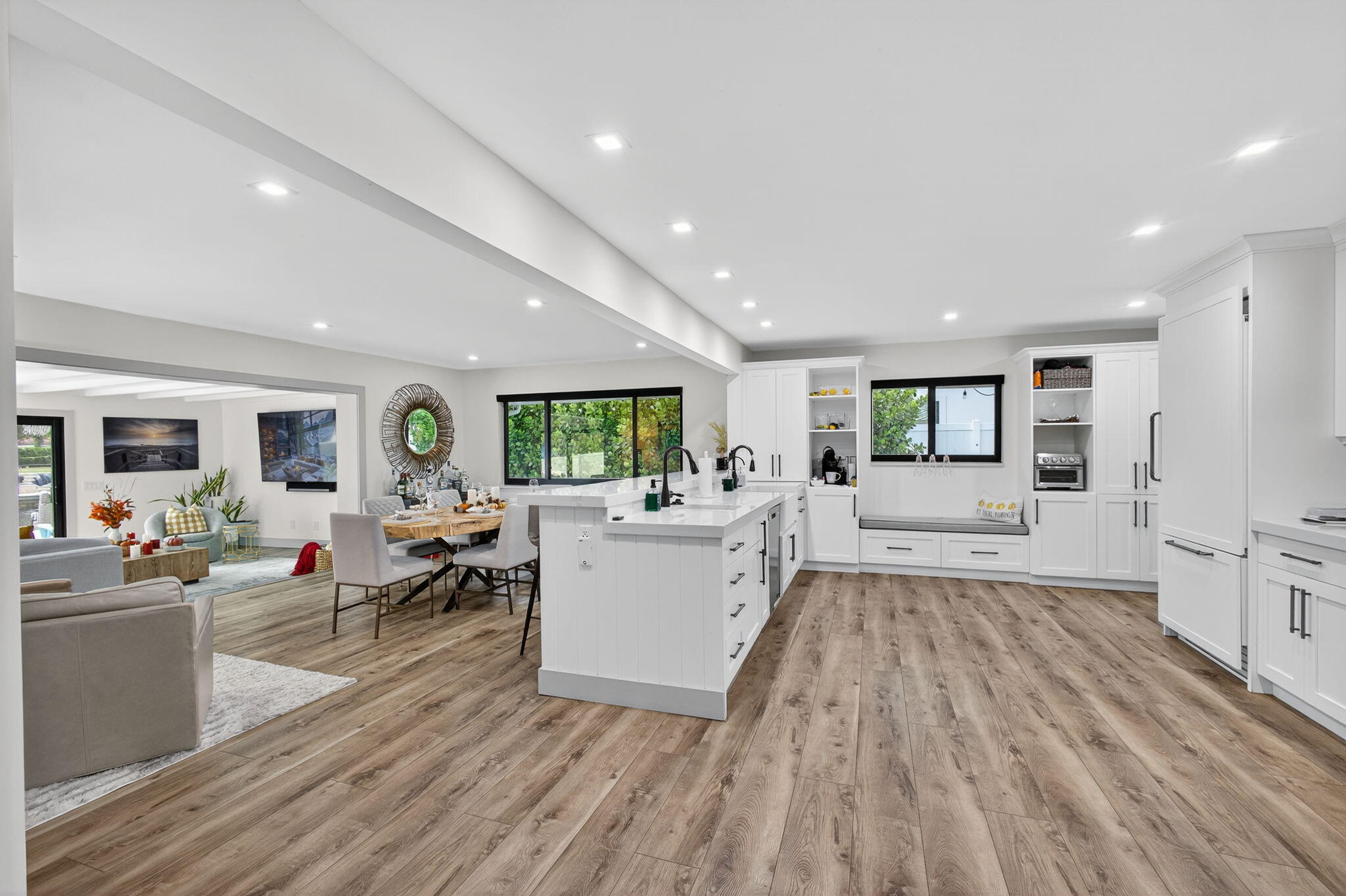 12 Leeward Circle Tequesta, FL 33469 - Photo 8 of 61 a living room with furniture and a wooden floor