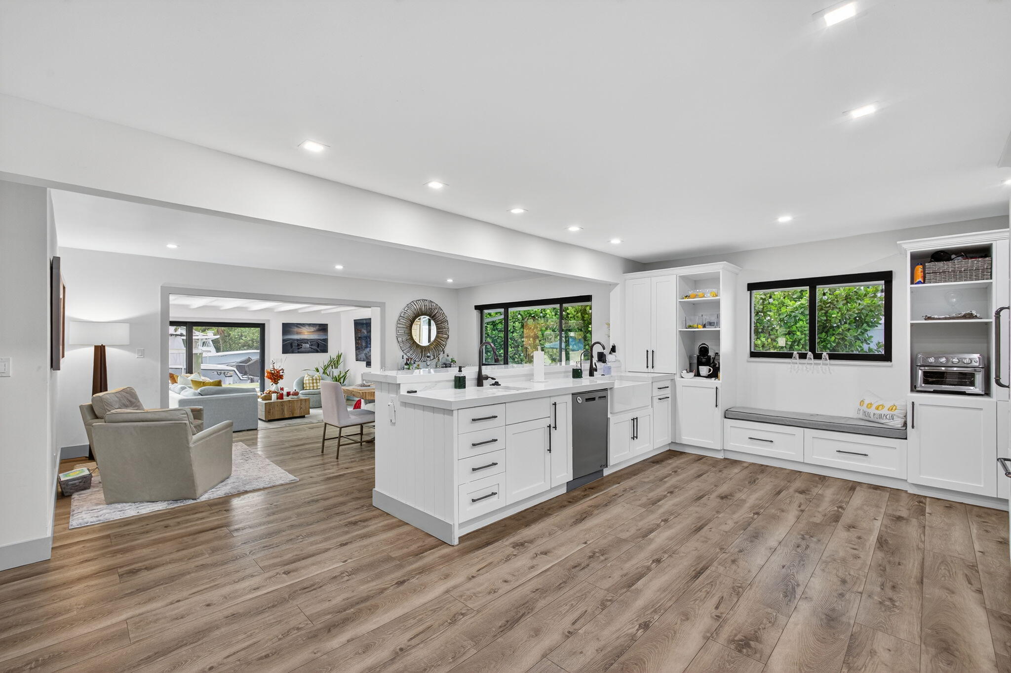 12 Leeward Circle Tequesta, FL 33469 - Photo 10 of 61 a living room with furniture and a wooden floor