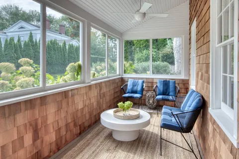 a outdoor living space with furniture and garden view