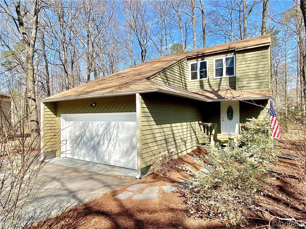 14120 Ridge Creek Road Midlothian, VA 23112 - Photo 1 of 30 a front view of a house with a yard