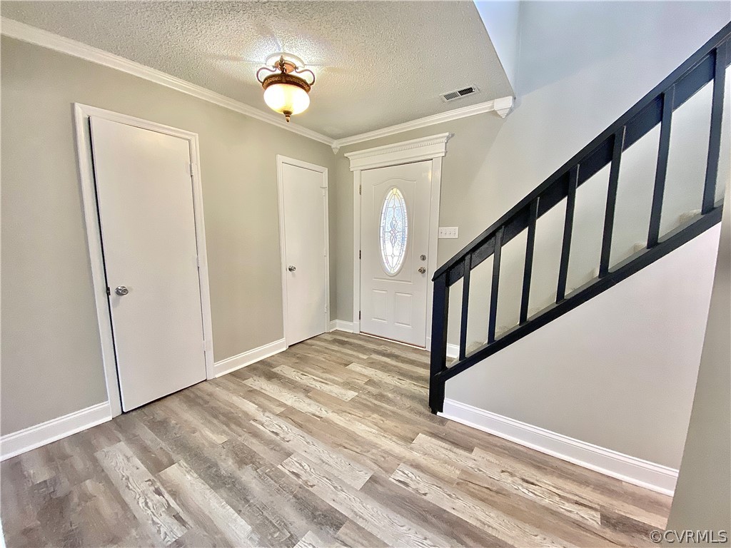 14120 Ridge Creek Road Midlothian, VA 23112 - Photo 14 of 30 a view of an entryway with staircase