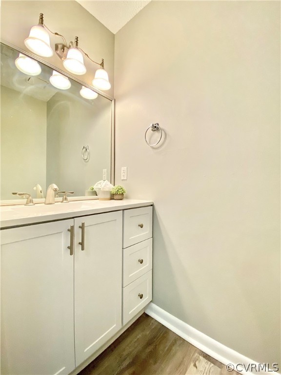 14120 Ridge Creek Road Midlothian, VA 23112 - Photo 15 of 30 a bathroom with a sink vanity and a mirror