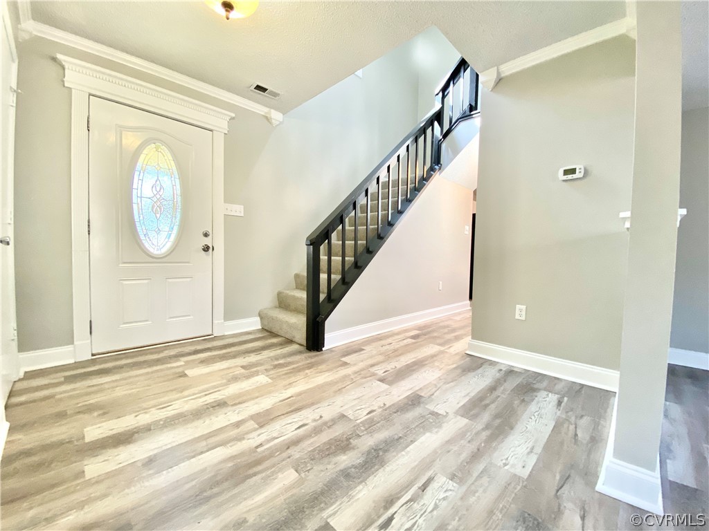 14120 Ridge Creek Road Midlothian, VA 23112 - Photo 16 of 30 a view of an entryway with staircase