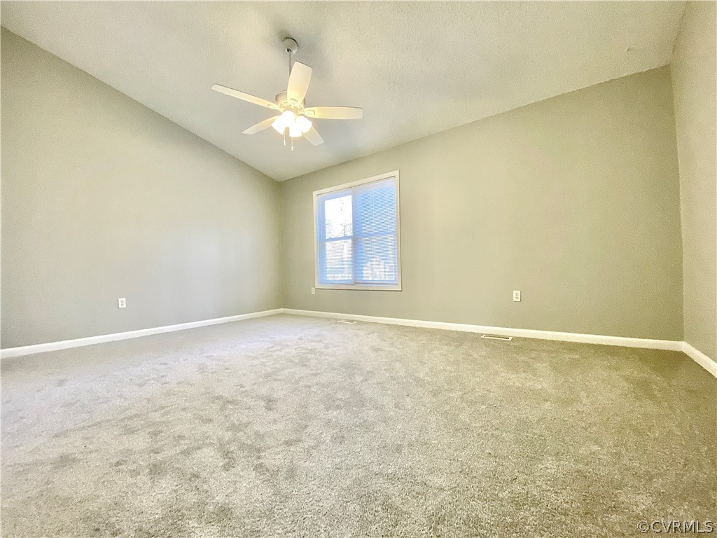14120 Ridge Creek Road Midlothian, VA 23112 - Photo 19 of 30 an empty room with a window and a ceiling fan