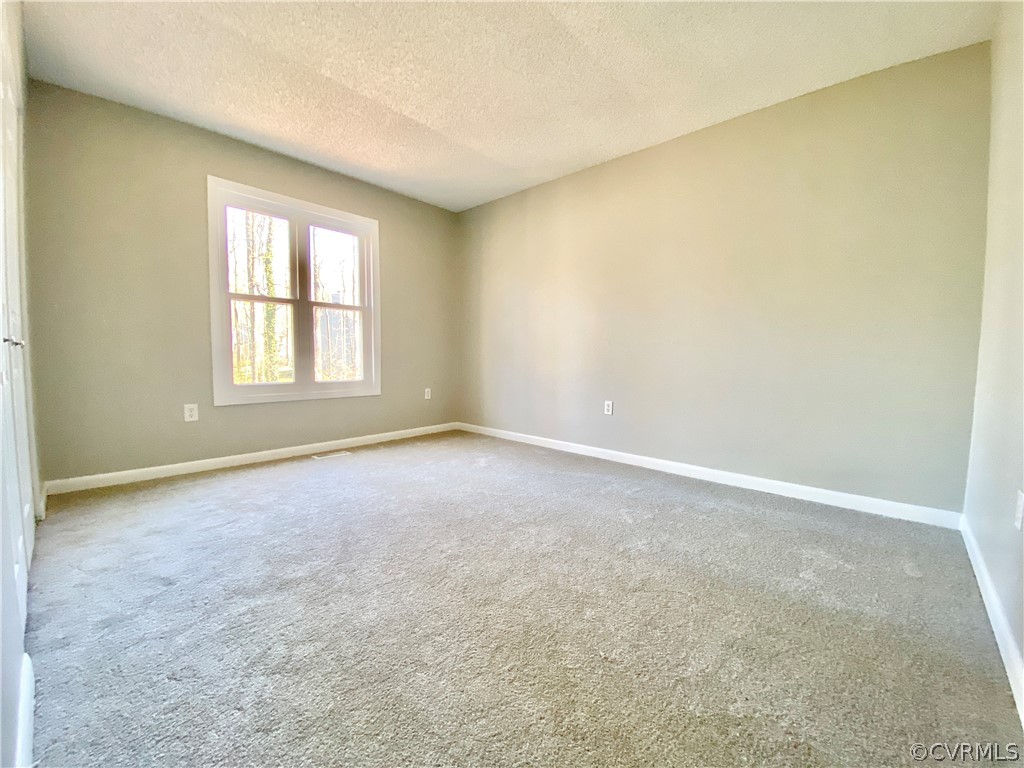14120 Ridge Creek Road Midlothian, VA 23112 - Photo 23 of 30 an empty room with a window
