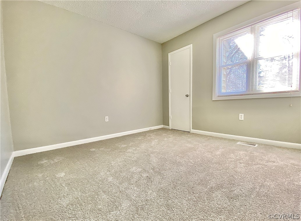14120 Ridge Creek Road Midlothian, VA 23112 - Photo 25 of 30 an empty room with windows