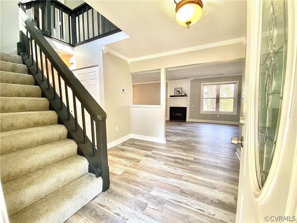 14120 Ridge Creek Road Midlothian, VA 23112 - Photo 3 of 30 a view of entryway and hall with wooden floor