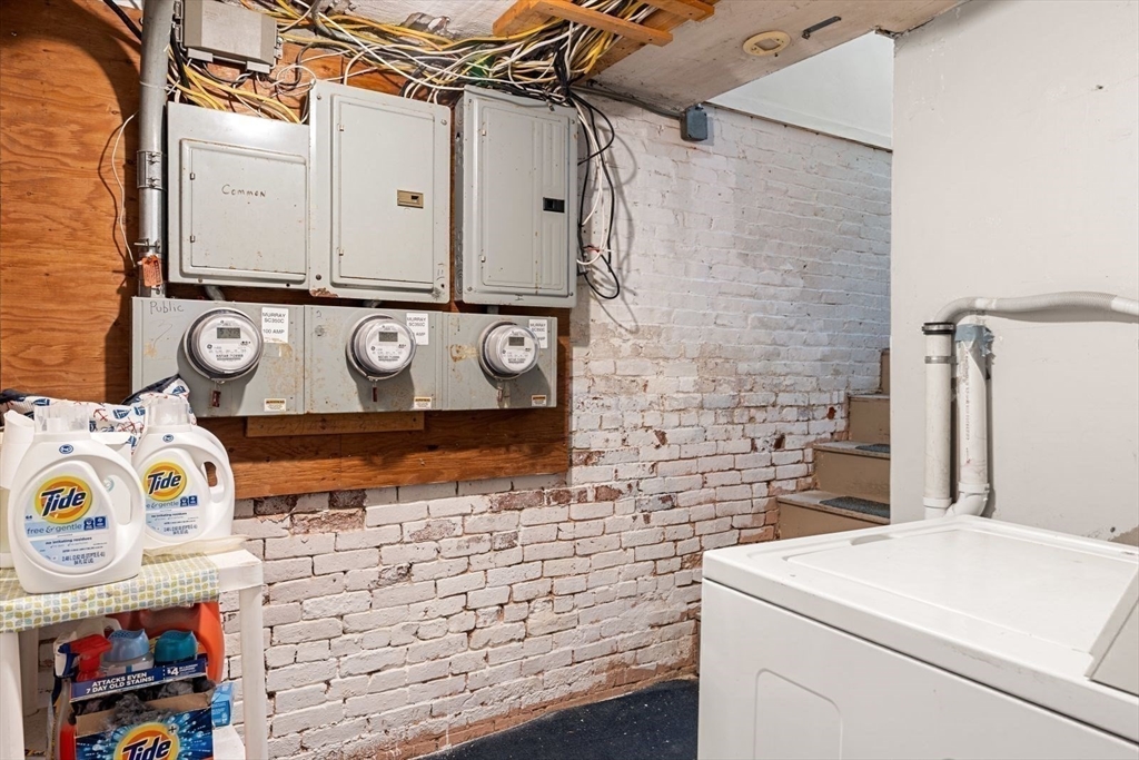 124 F Street Boston, MA 02127 - Photo 27 of 28 a utility room with dryer and washer