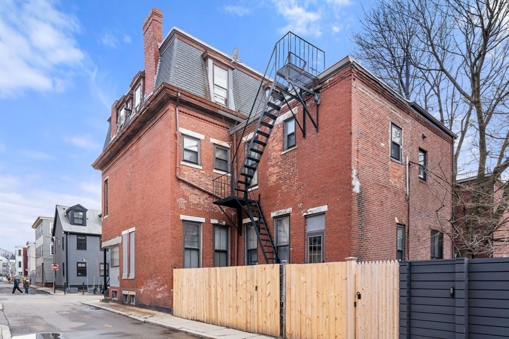 124 F Street Boston, MA 02127 - Photo 5 of 28 a view of a building with a street