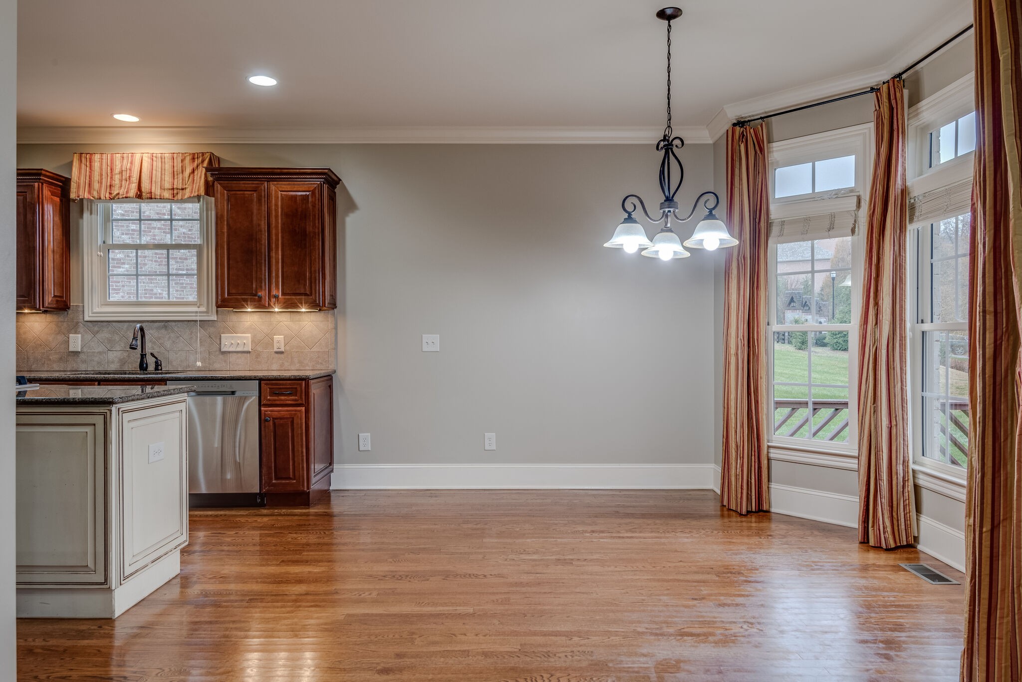 281 King Arthur Circle Franklin, TN 37067 - Photo 17 of 47 a kitchen with stainless steel appliances granite countertop a refrigerator and a sink
