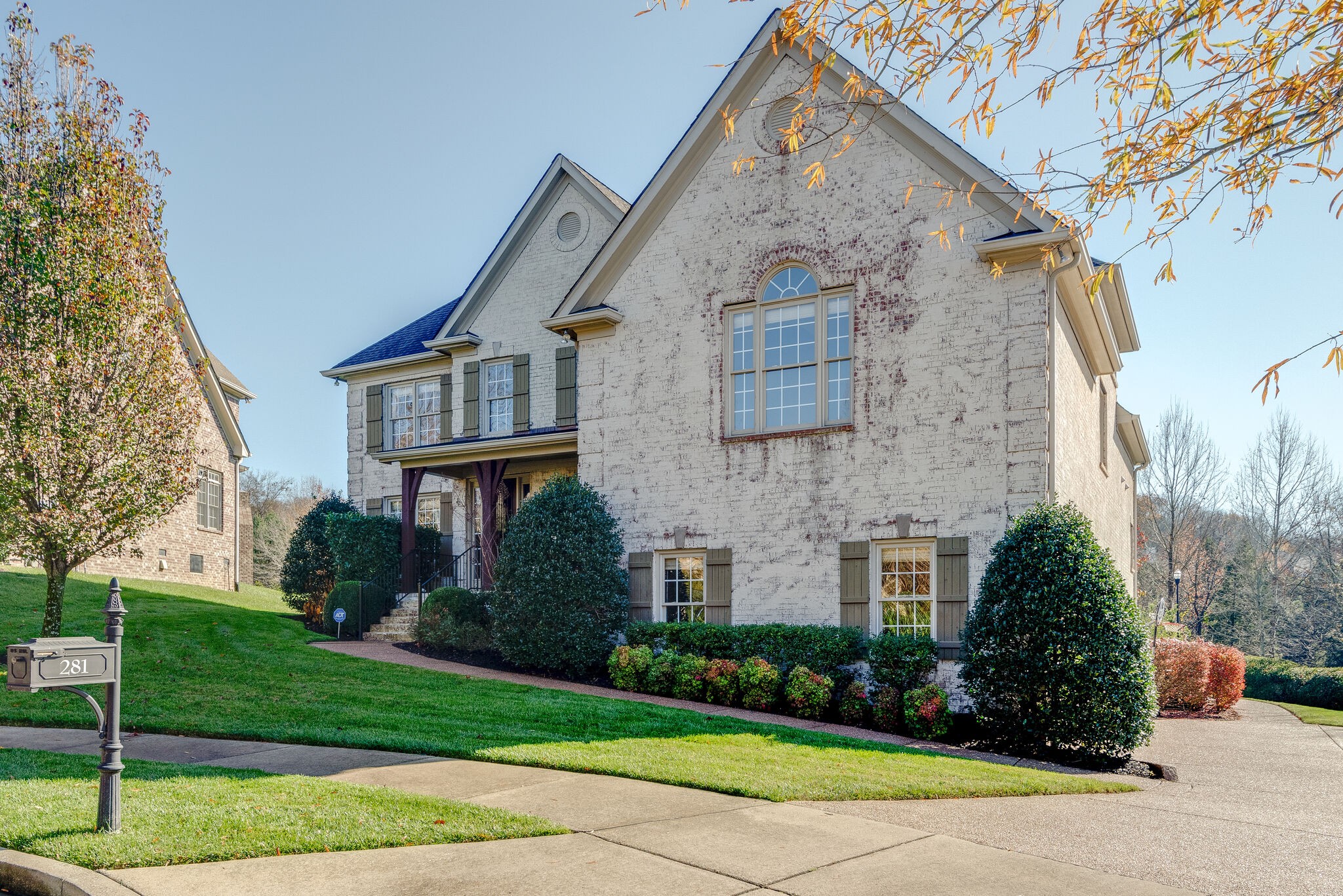 281 King Arthur Circle Franklin, TN 37067 - Photo 3 of 47 a front view of a house with a yard