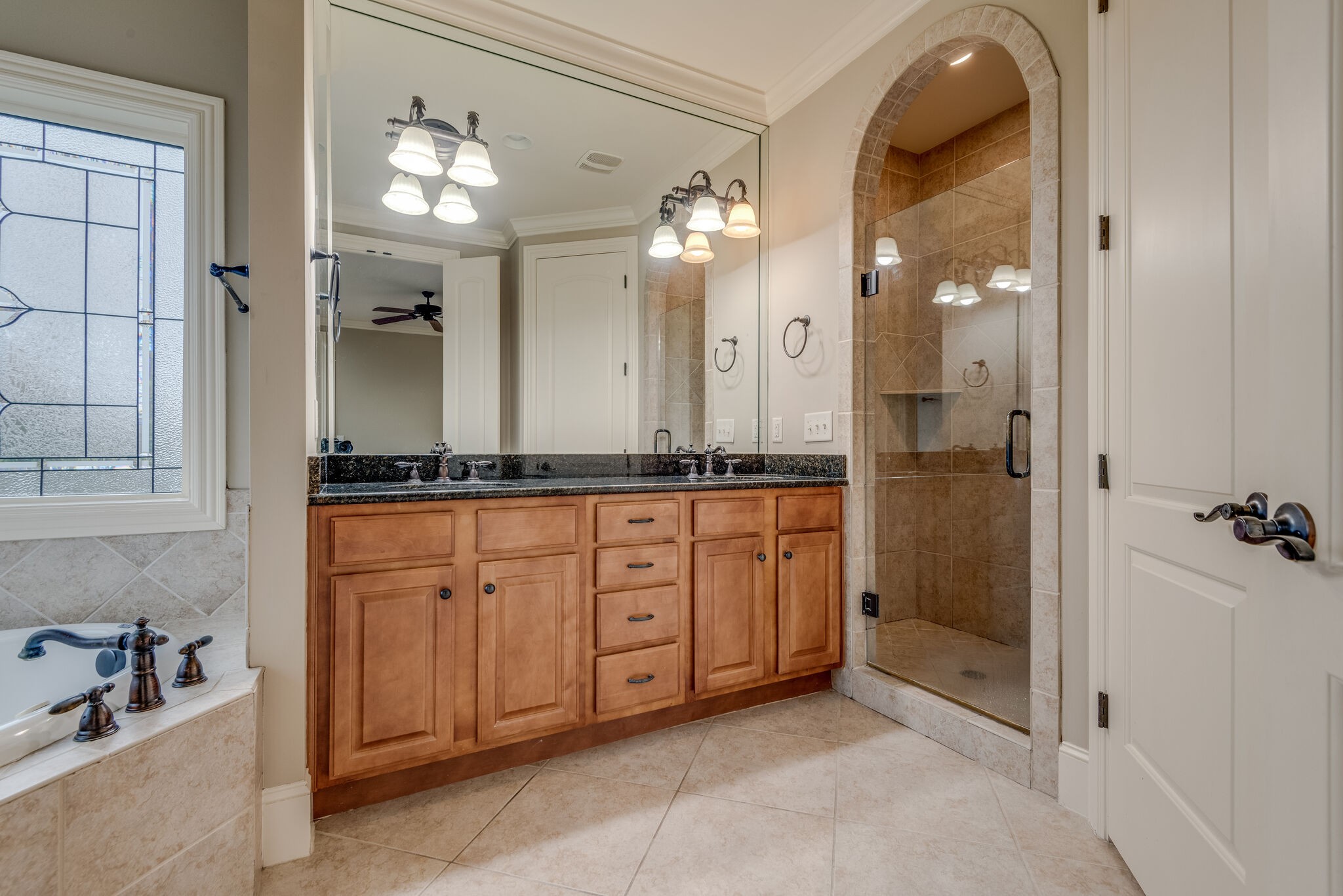 281 King Arthur Circle Franklin, TN 37067 - Photo 25 of 47 a spacious bathroom with a granite countertop sink mirror and shower