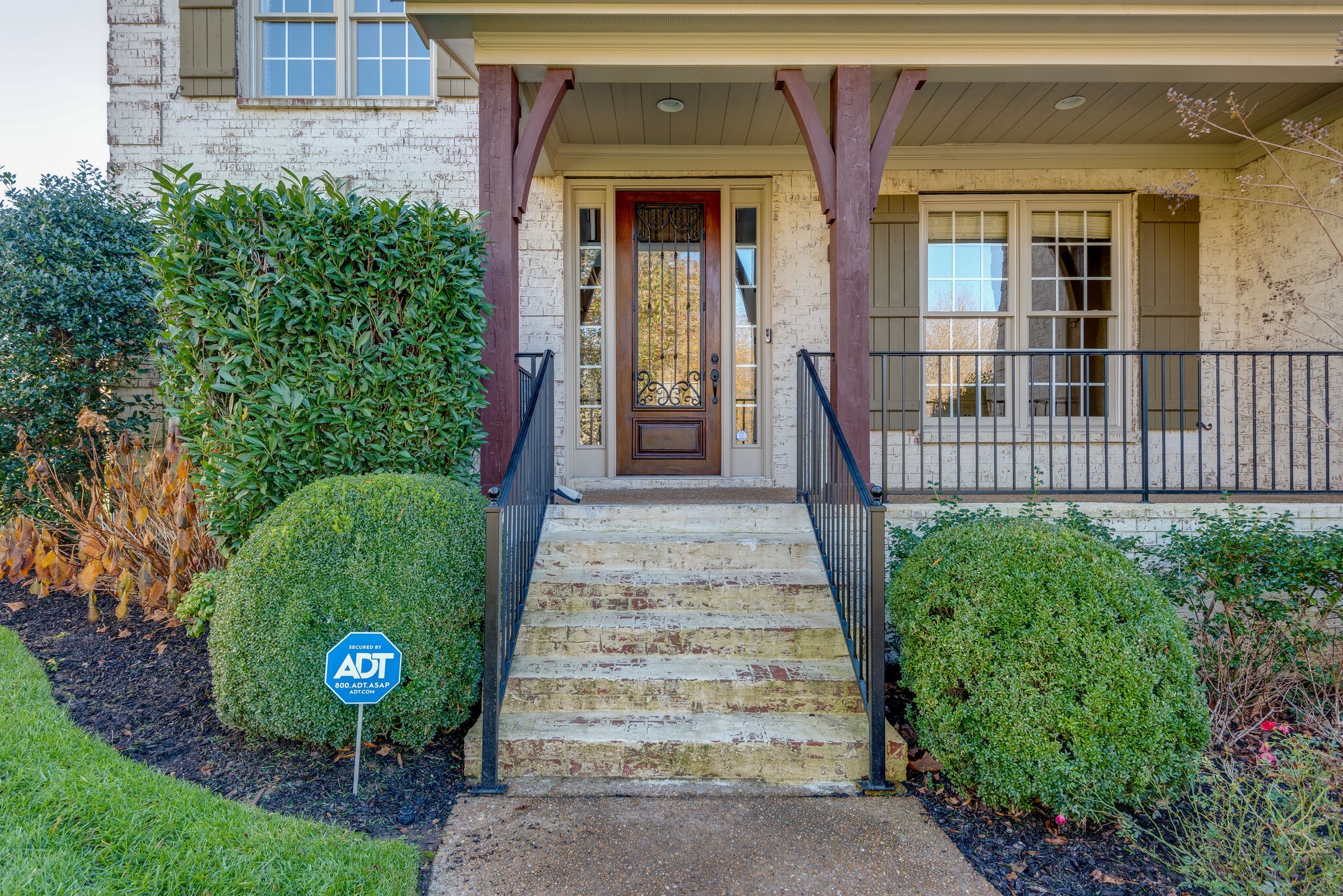 281 King Arthur Circle Franklin, TN 37067 - Photo 4 of 47 front view of a house with a garden