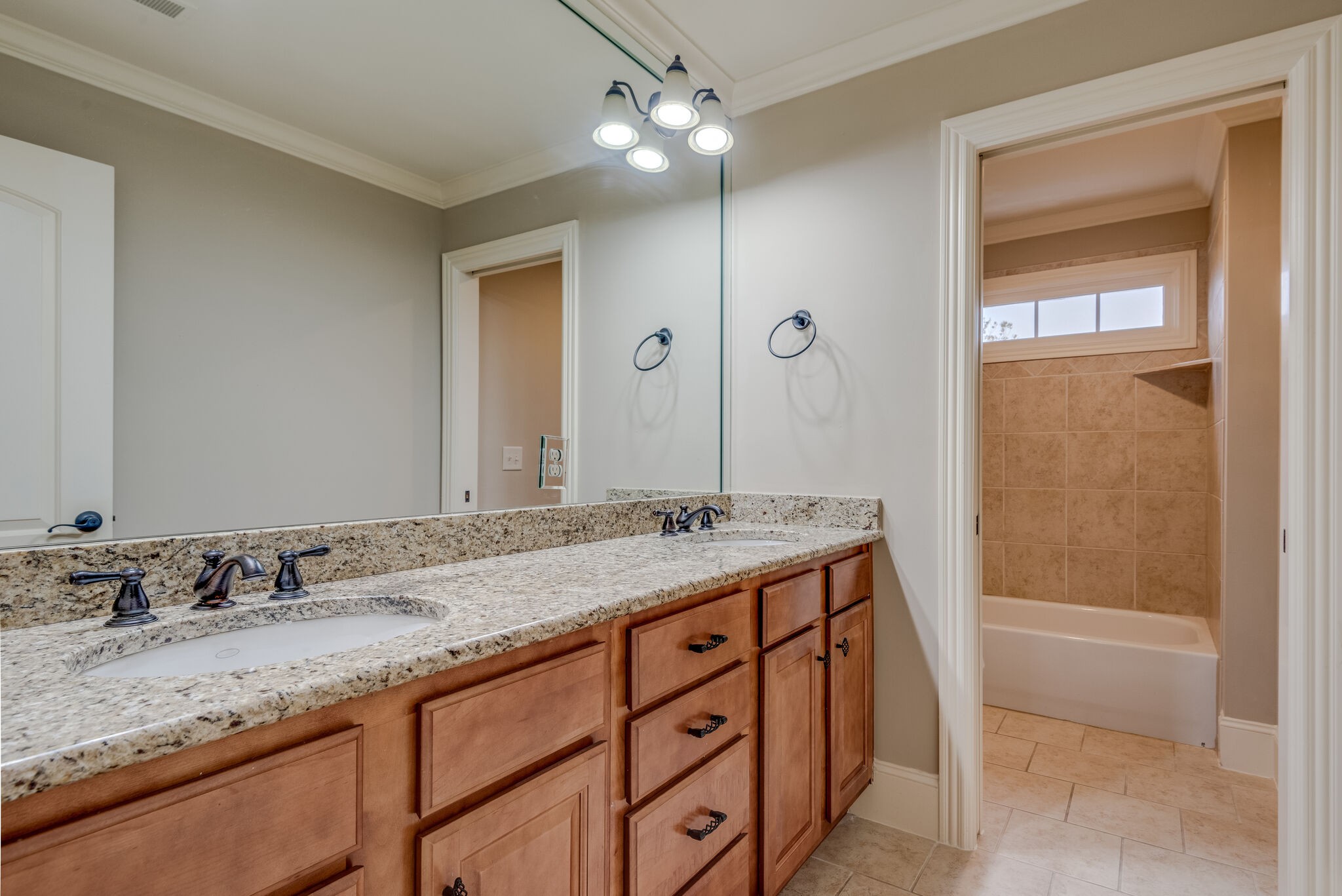 281 King Arthur Circle Franklin, TN 37067 - Photo 32 of 47 a bathroom with a granite countertop sink and a mirror