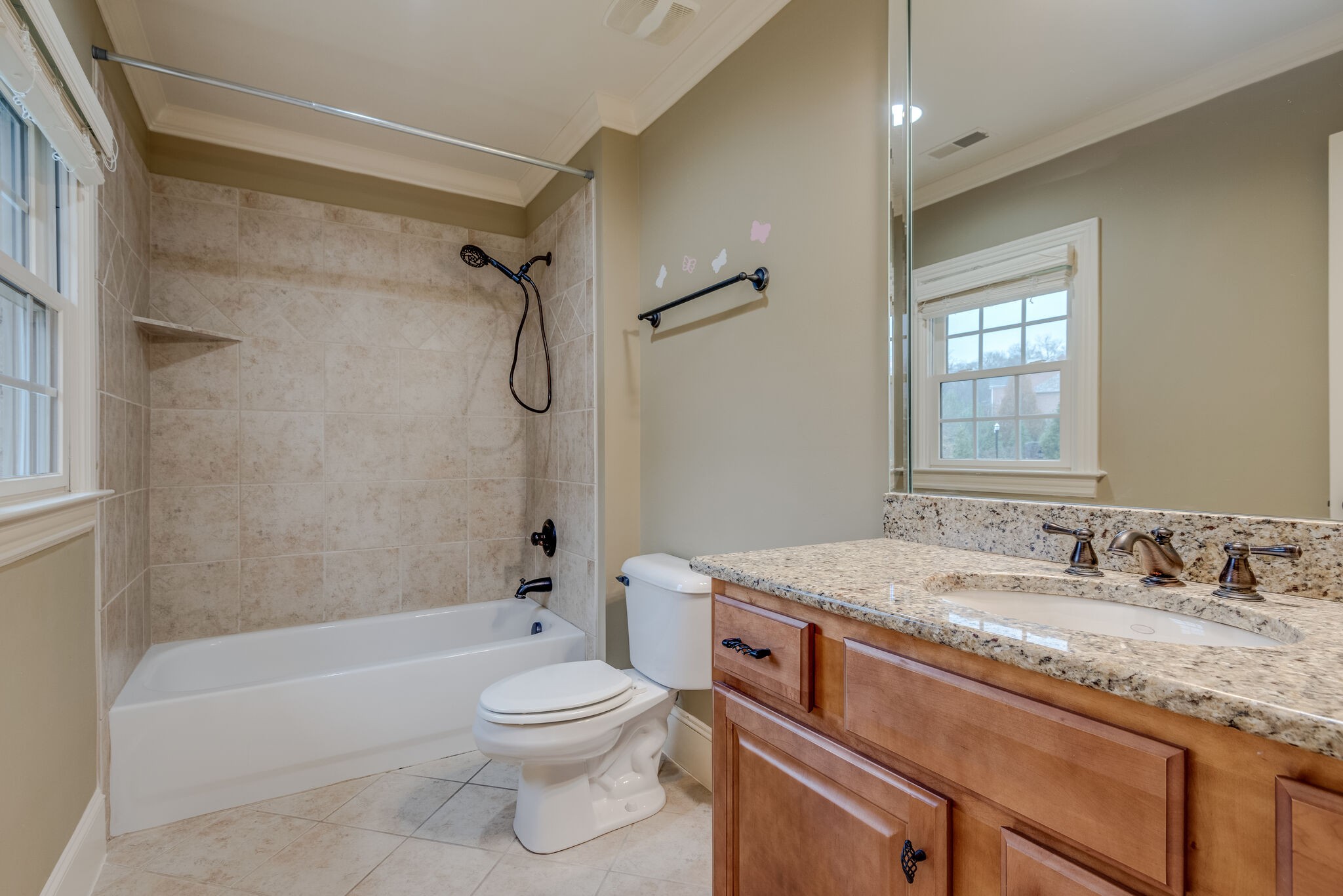 281 King Arthur Circle Franklin, TN 37067 - Photo 35 of 47 a bathroom with a granite countertop sink toilet and shower